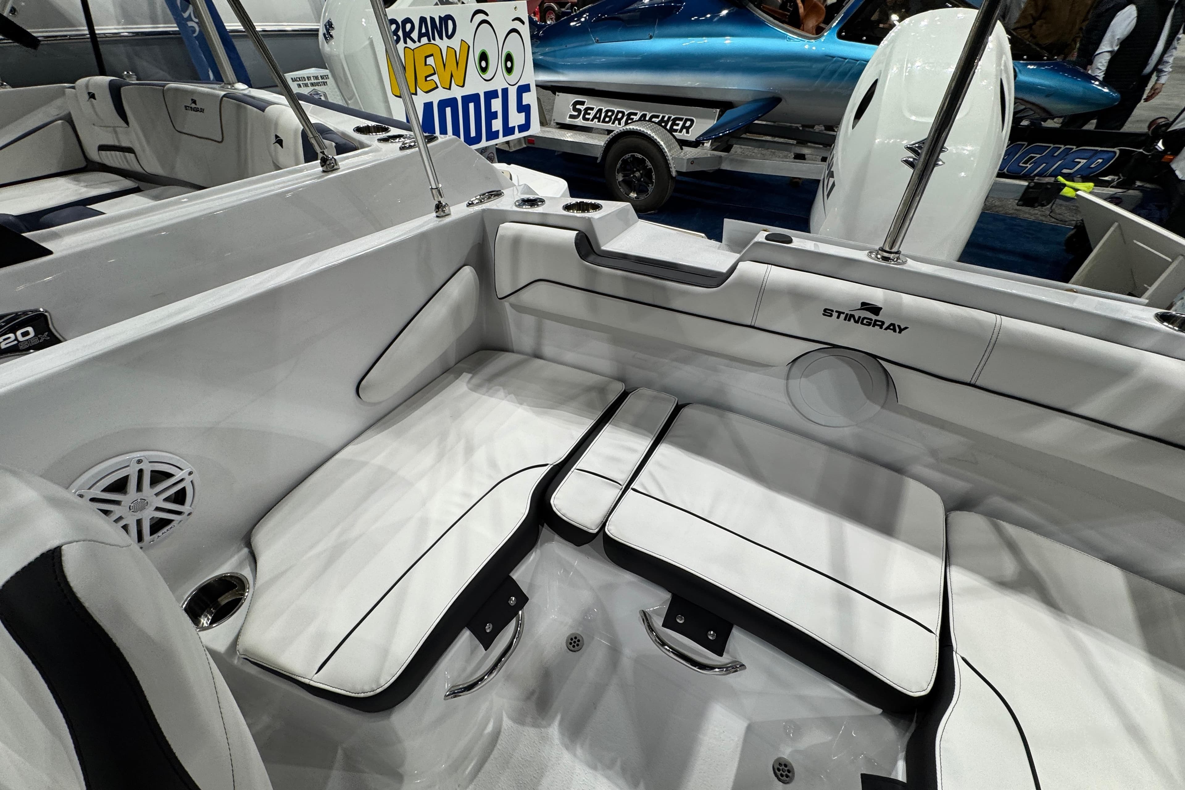 2026 Stingray 172 DC boat interior with white seating and sleek design.