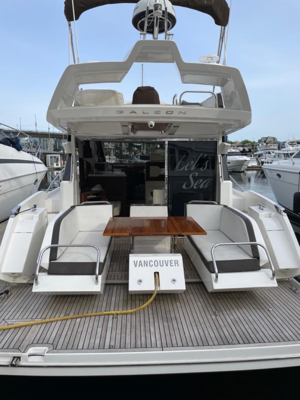 Galeon 430 Skydeck 2017 yacht docked in Vancouver marina.