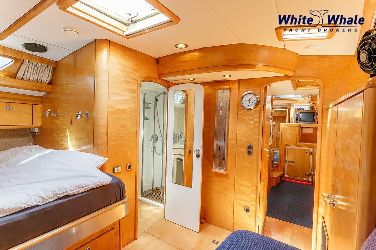 Luxurious interior of 1989 Dubbel & Jesse Nordsee 55 yacht with wood finish and modern amenities.