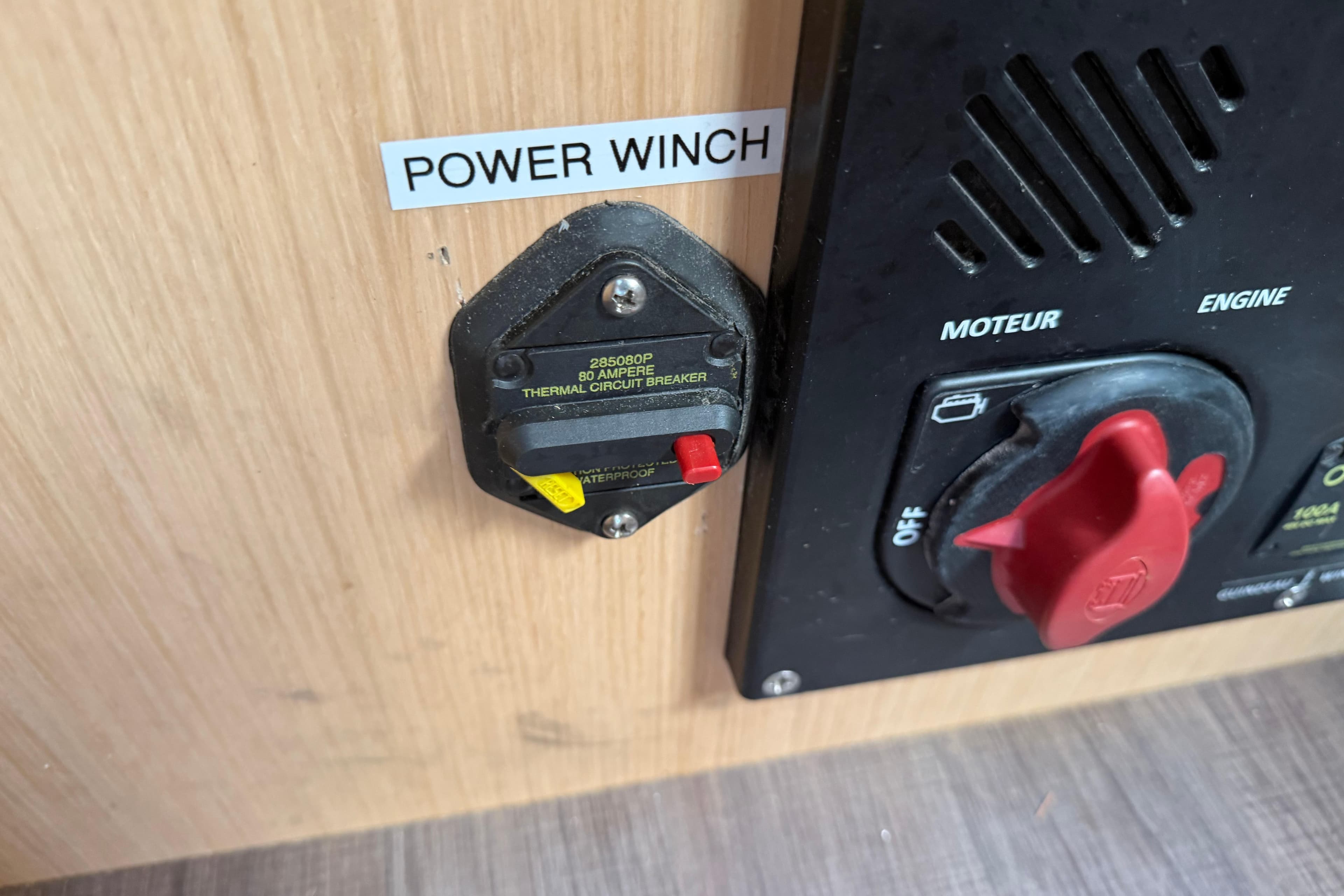 Power winch control panel on 2017 Beneteau Oceanis 38 sailboat.