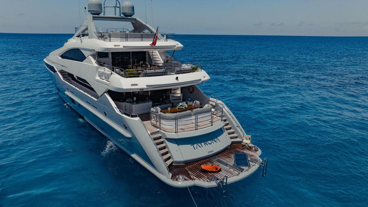 Luxurious 2012 Sunseeker 131 Yacht cruising on clear blue ocean waters.