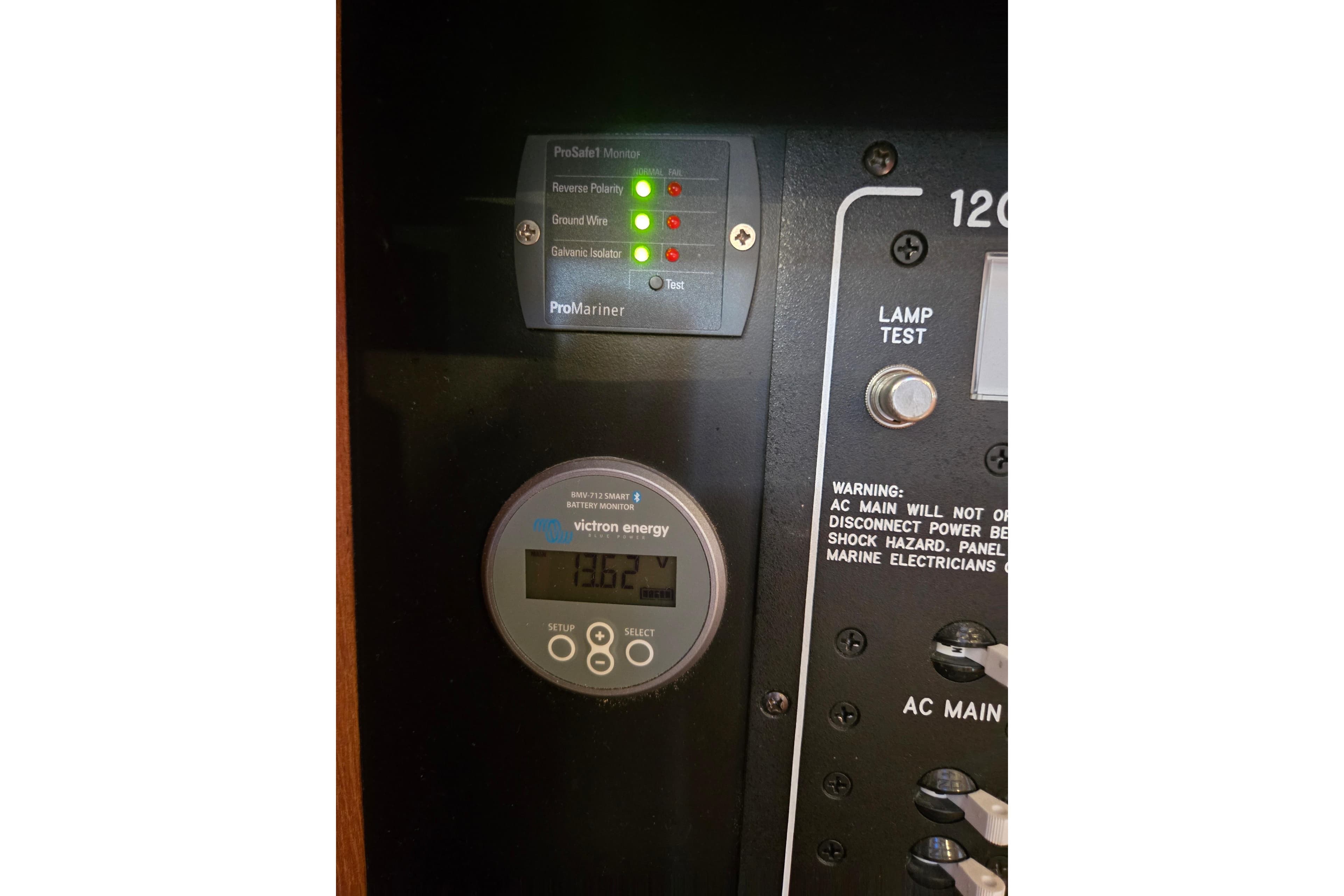 Electrical panel of 2006 Island Packet 370 sailboat with Victron Energy monitor.