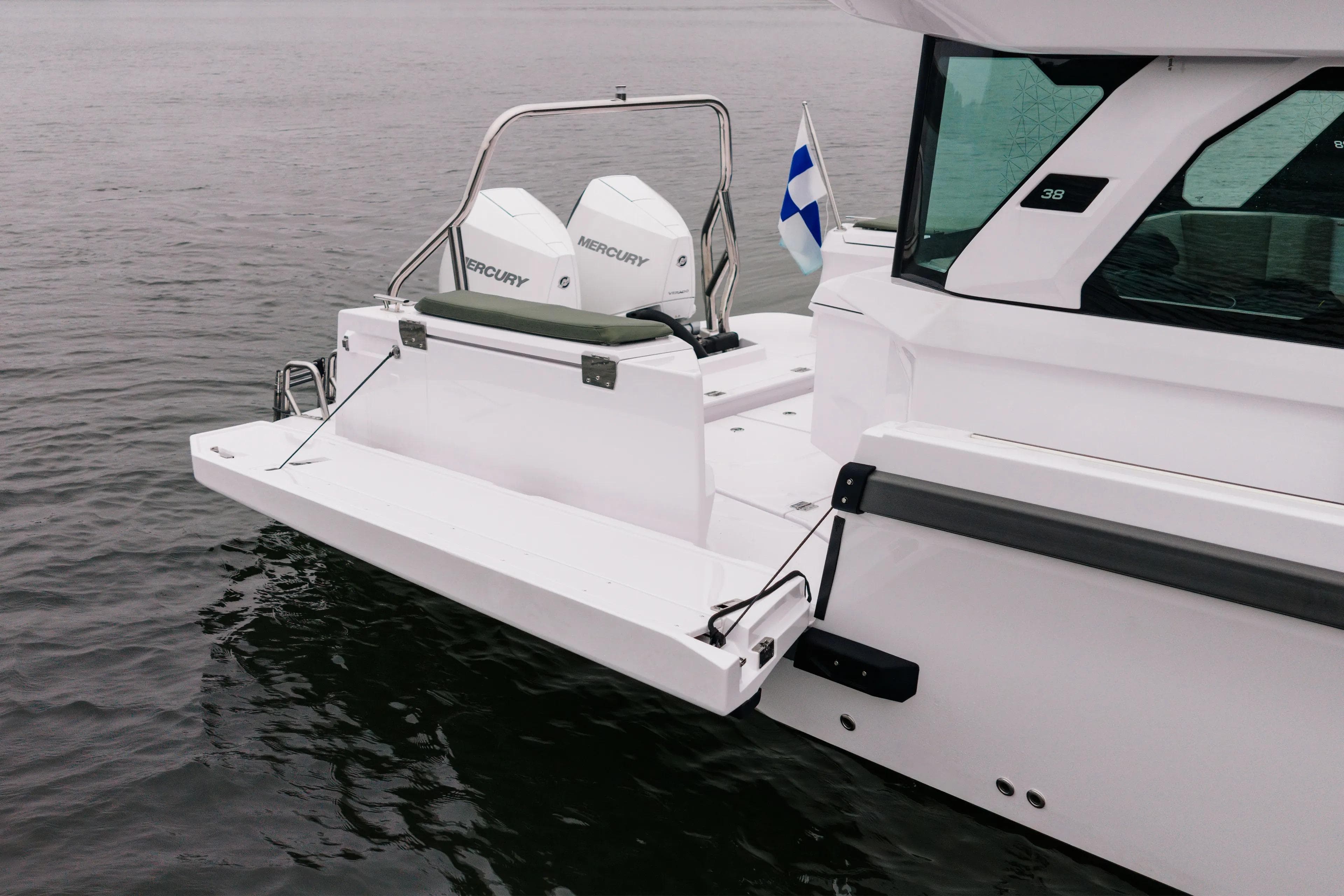 2026 Axopar 38 Cross Cabin boat with dual Mercury engines on water.