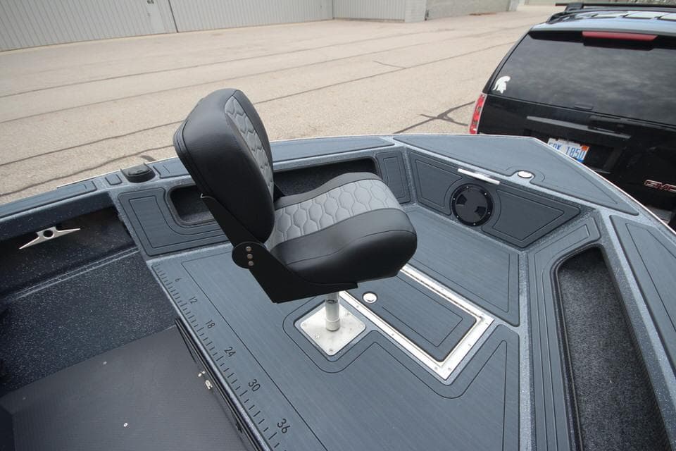 2025 Weldcraft 200 Rebel boat interior with swivel seat and measurement markings.