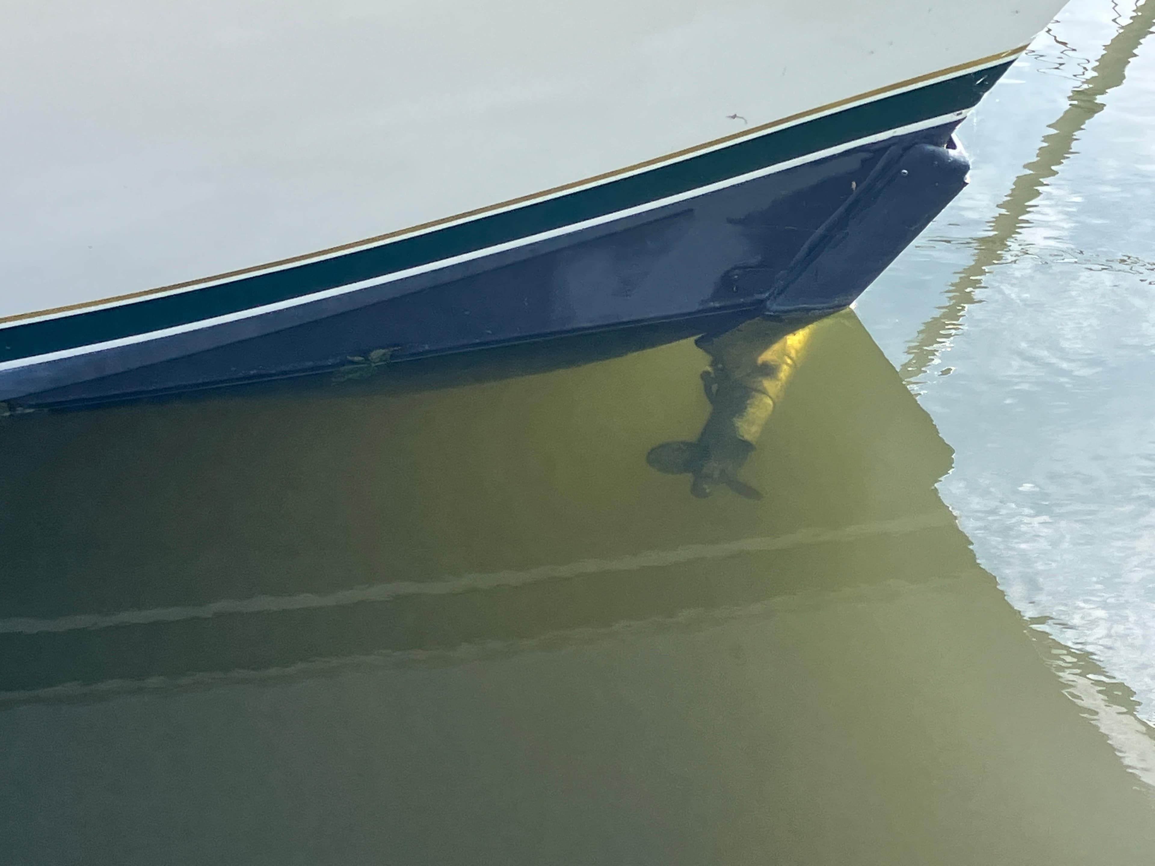 Bow of a 1995 Egg Harbor 42 boat partially submerged in water.
