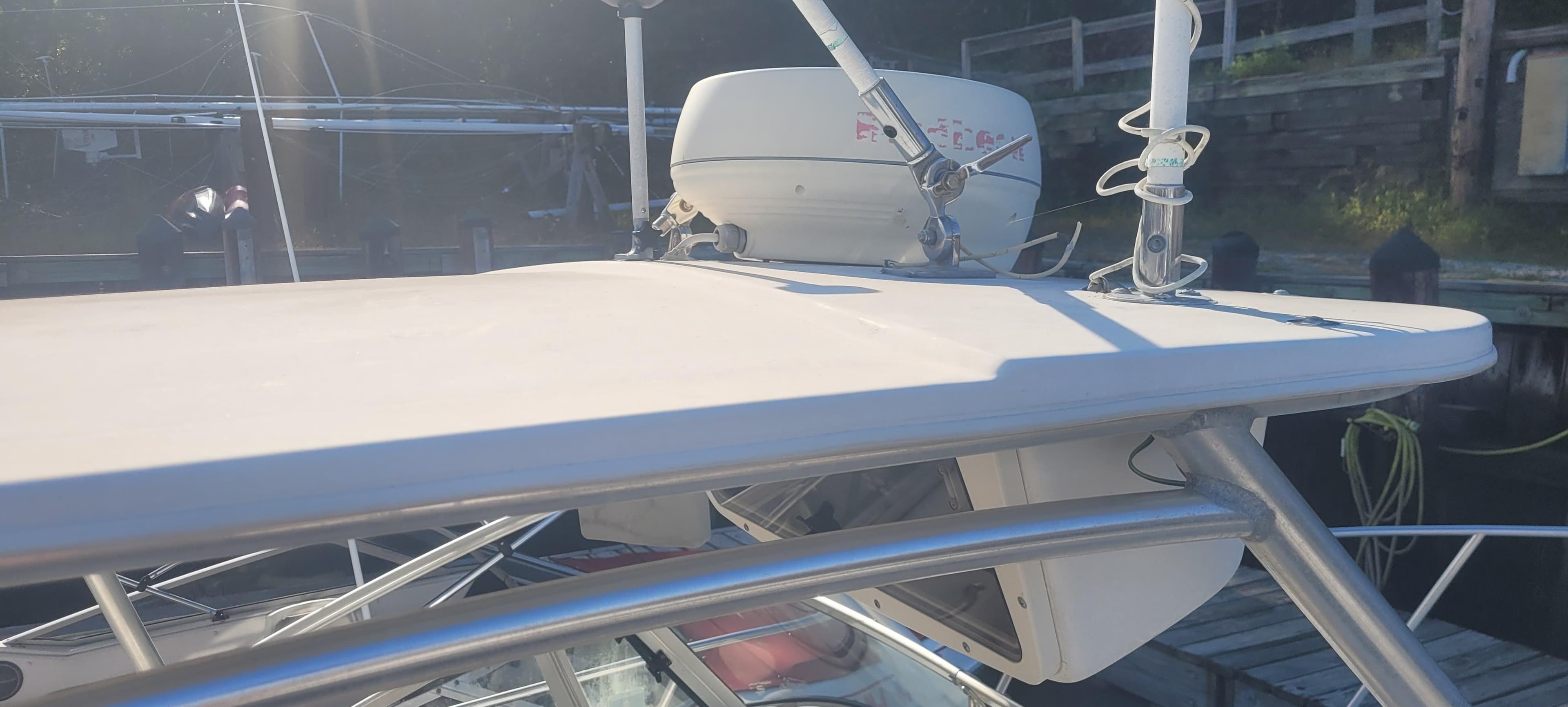 1999 Boston Whaler 23 Conquest boat with radar equipment on top.