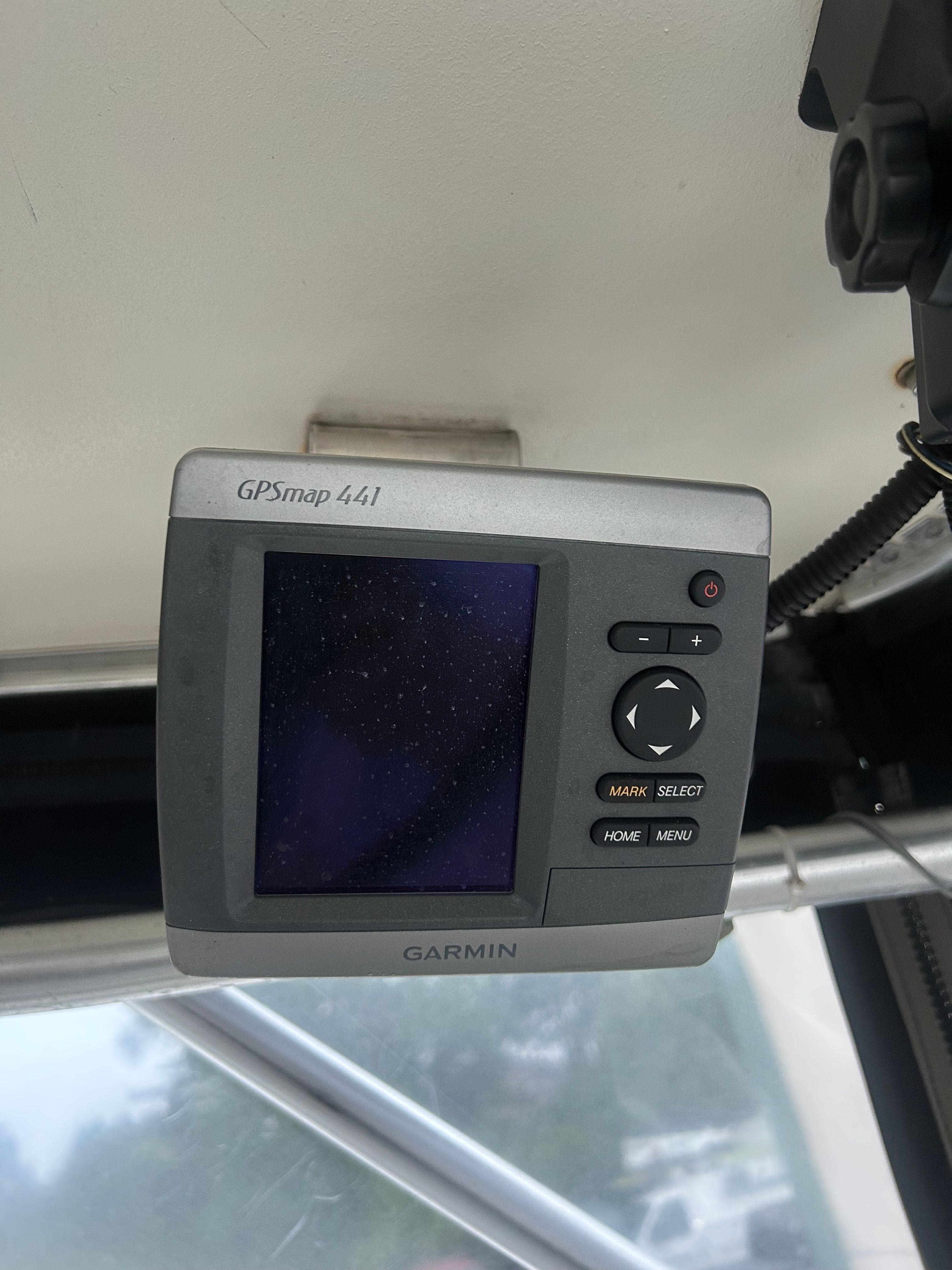 Garmin GPSmap 441 on 1998 Carolina Classic 25 Express boat dashboard.