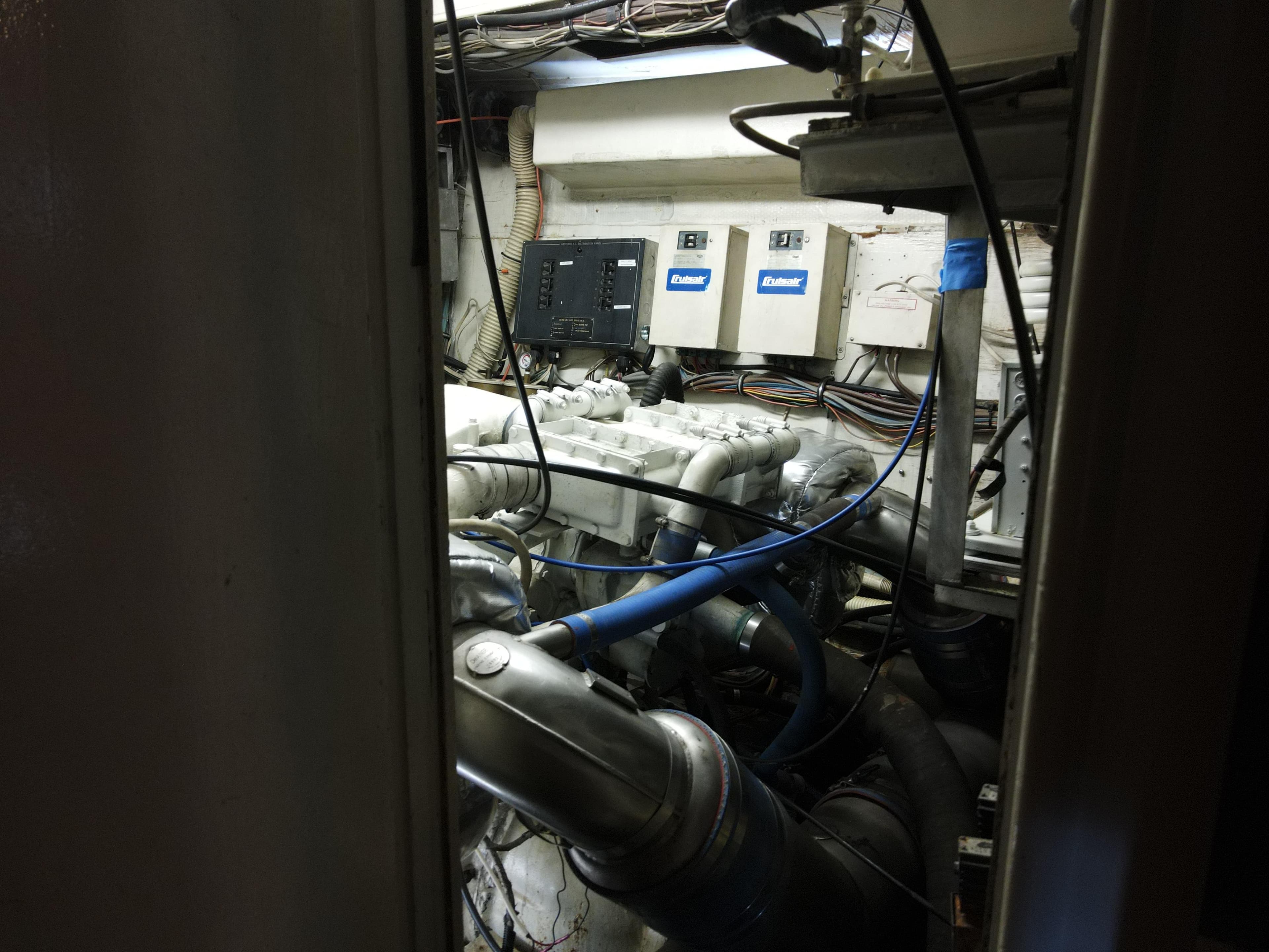 Engine room of 1979 Hatteras 58 Cockpit Motor Yacht.