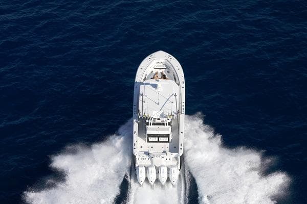 2024 Blackfin 400CC boat cruising on open water, aerial view.