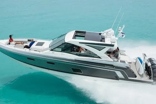 2019 Formula 430 Super Sport Crossover cruising on turquoise waters.