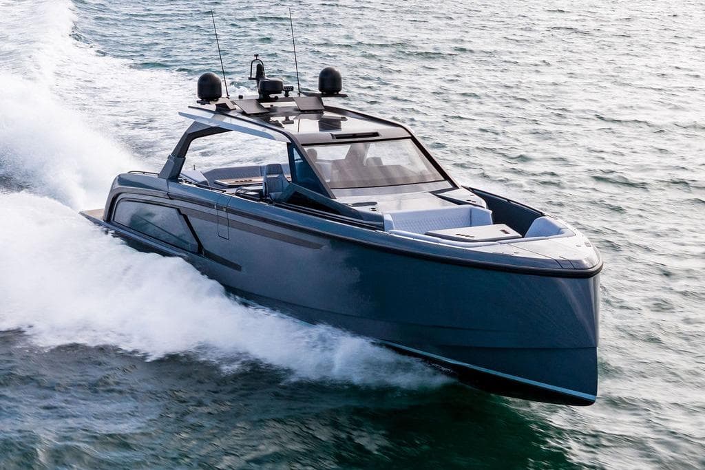 2024 Vanquish Yachts VQ55 cruising on open water, showcasing sleek design and performance.