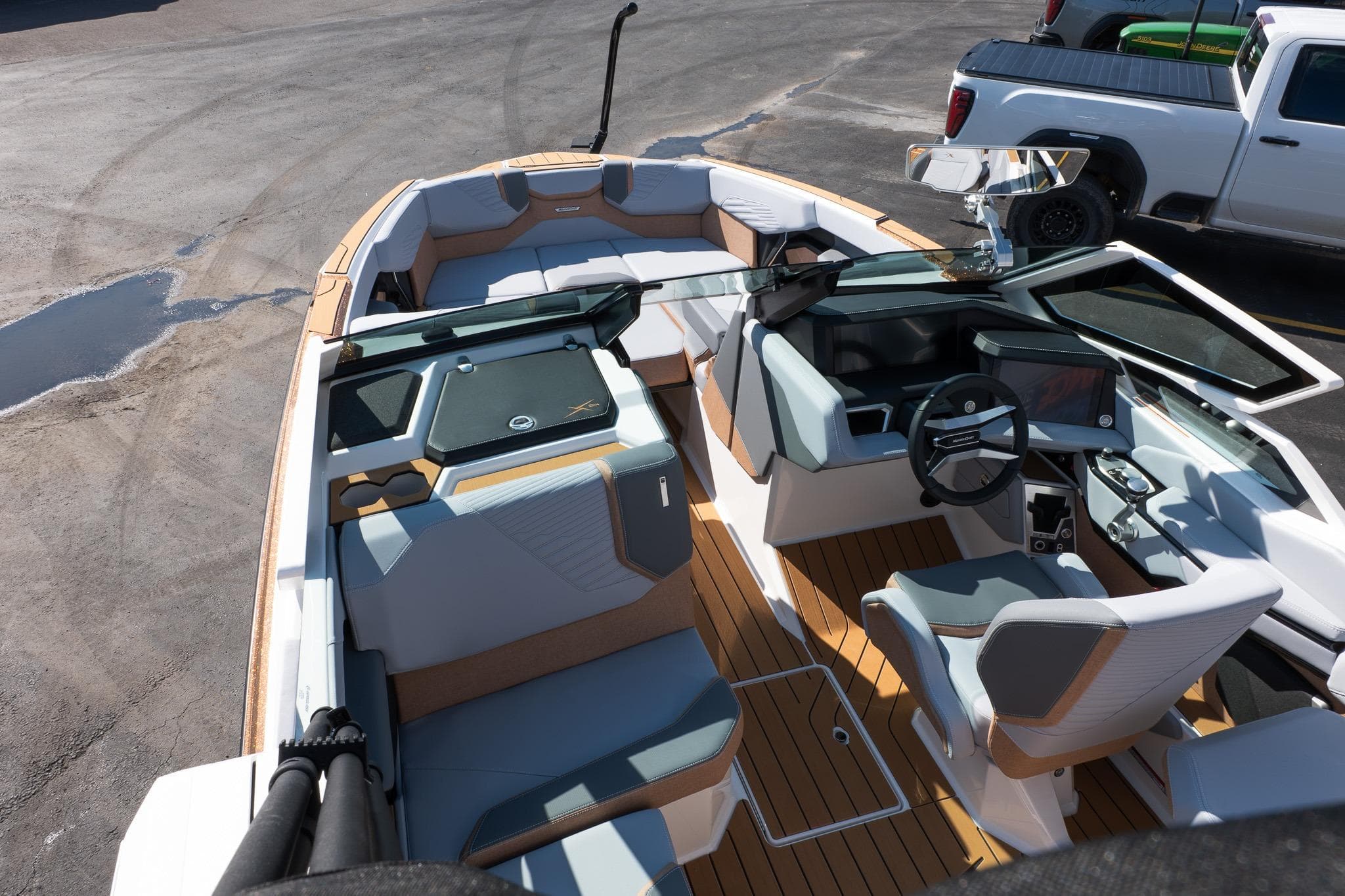 2026 MasterCraft X24 boat interior with modern seating and dashboard design.