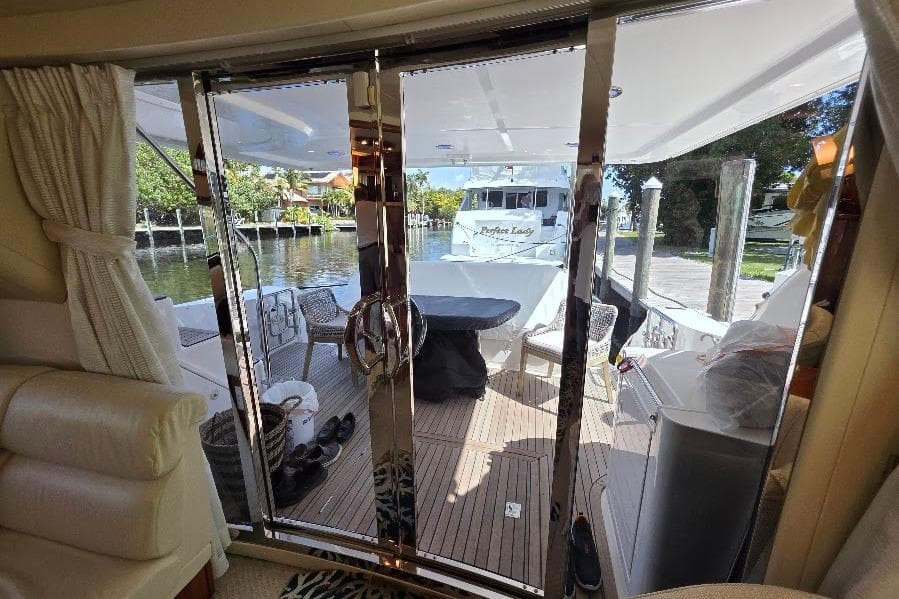 Interior view of 2008 Neptunus Flybridge MY yacht, showcasing deck and marina.