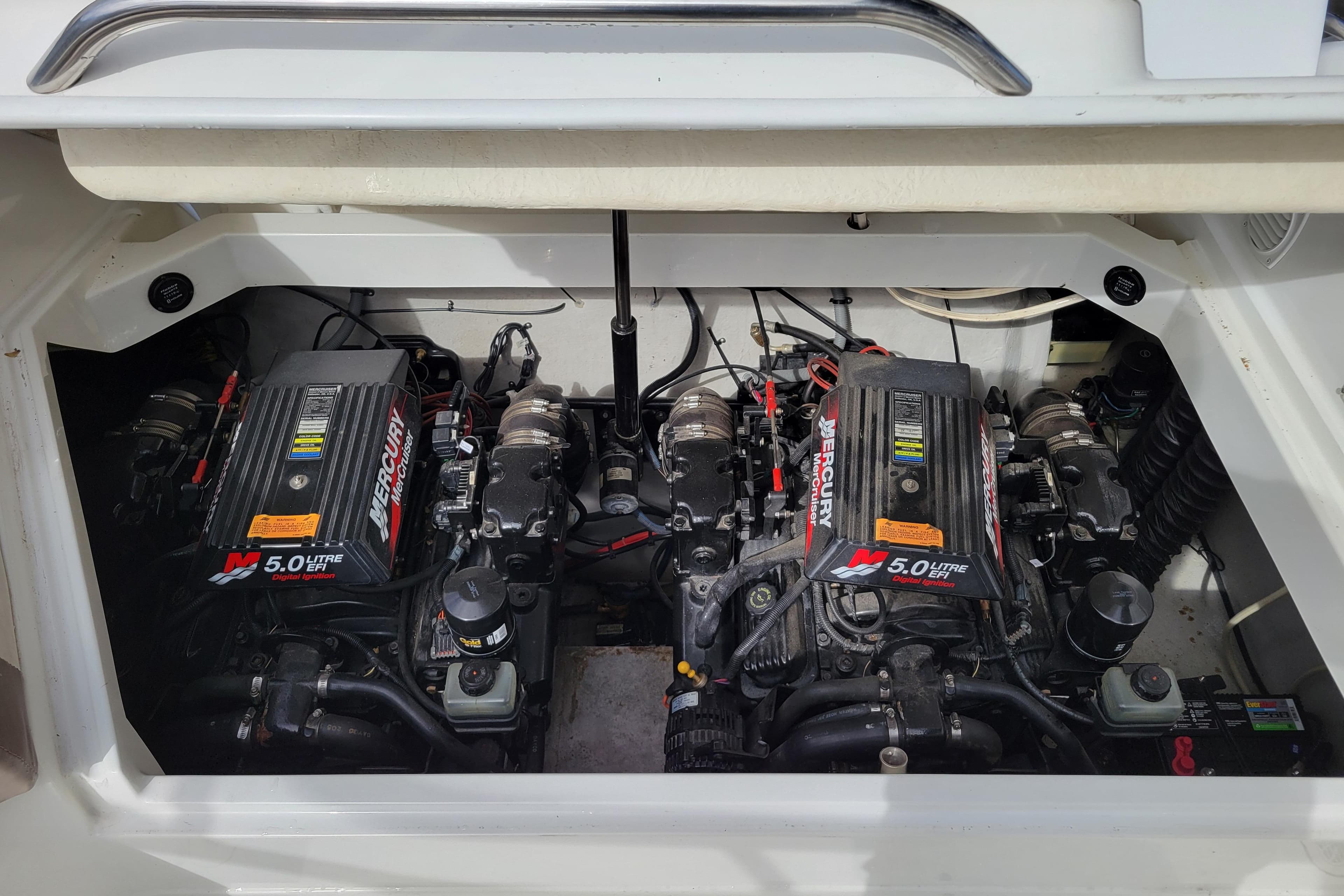 Twin Mercury 5.0L engines in a 2002 Cobalt 293 boat engine compartment.