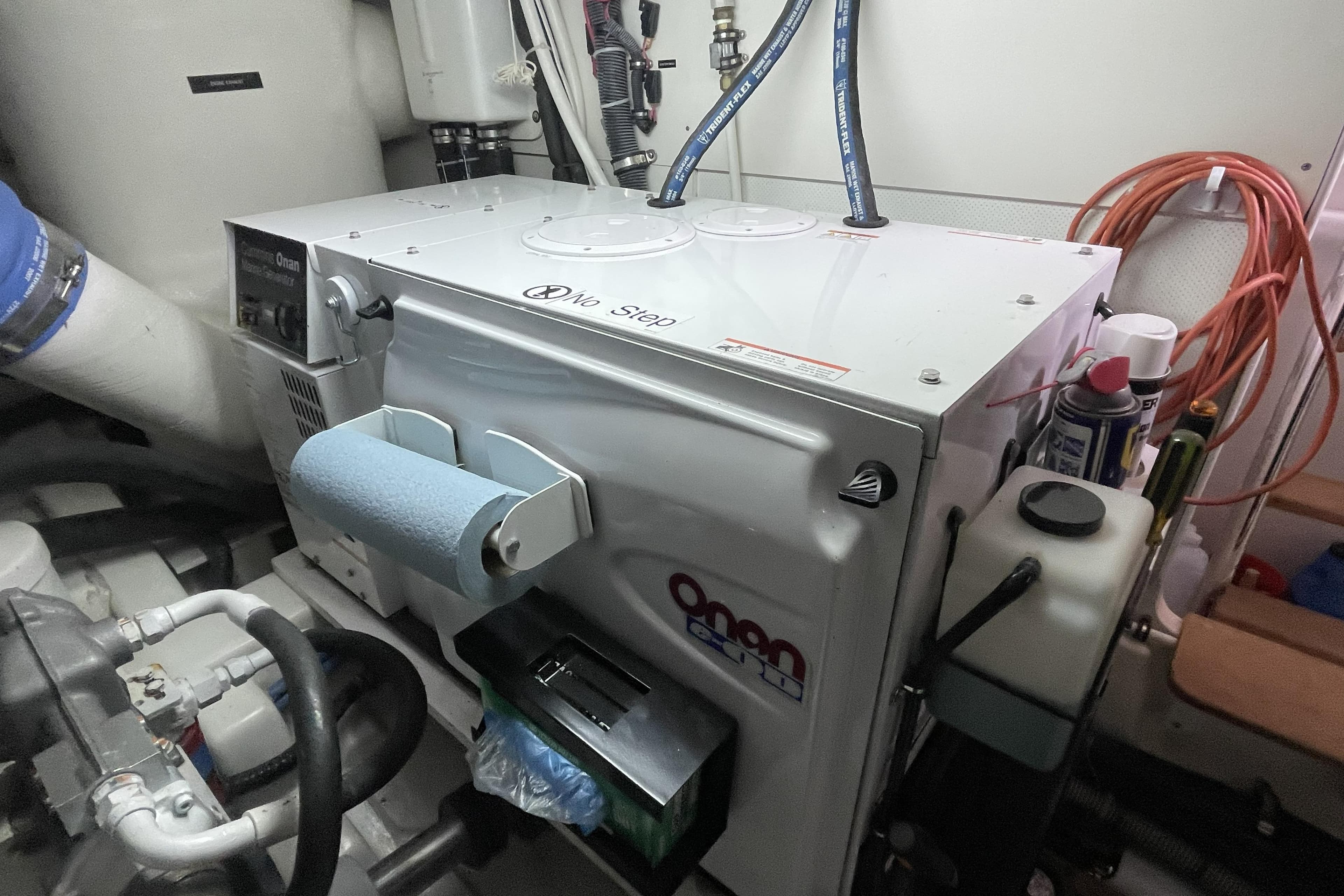 Engine room of 2008 Grand Banks 55 Eastbay SX with Onan generator.