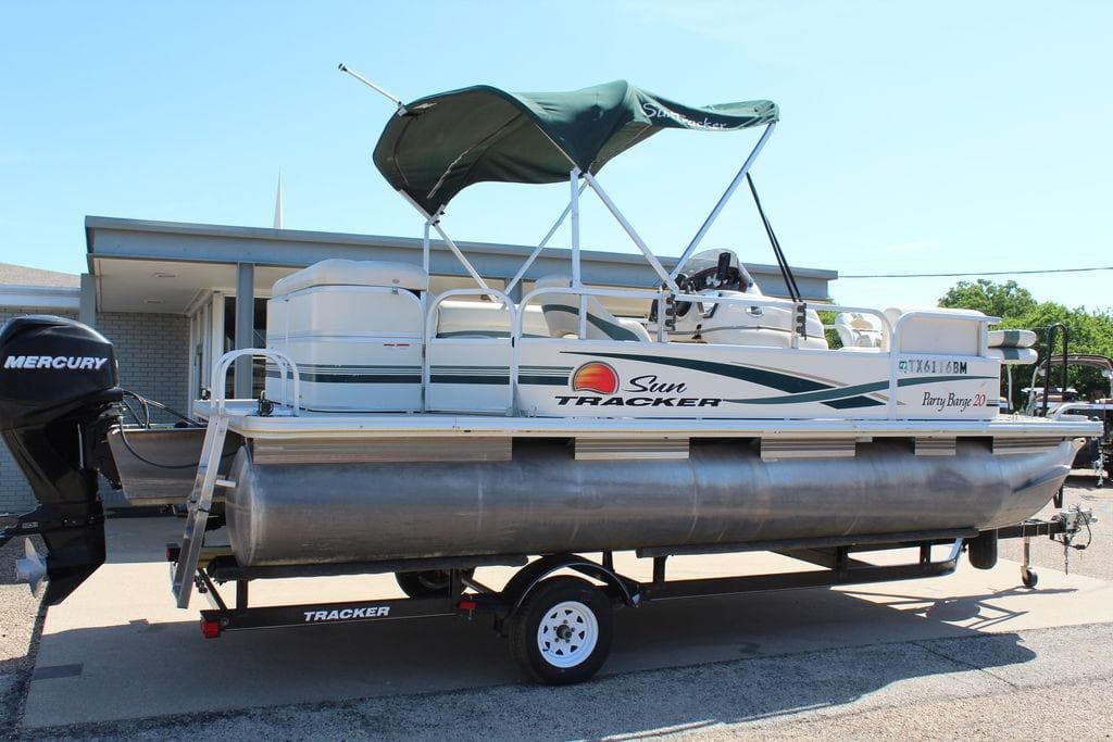 2011 Sun Tracker Party Barge 20 Regency Edition pontoon boat on trailer.