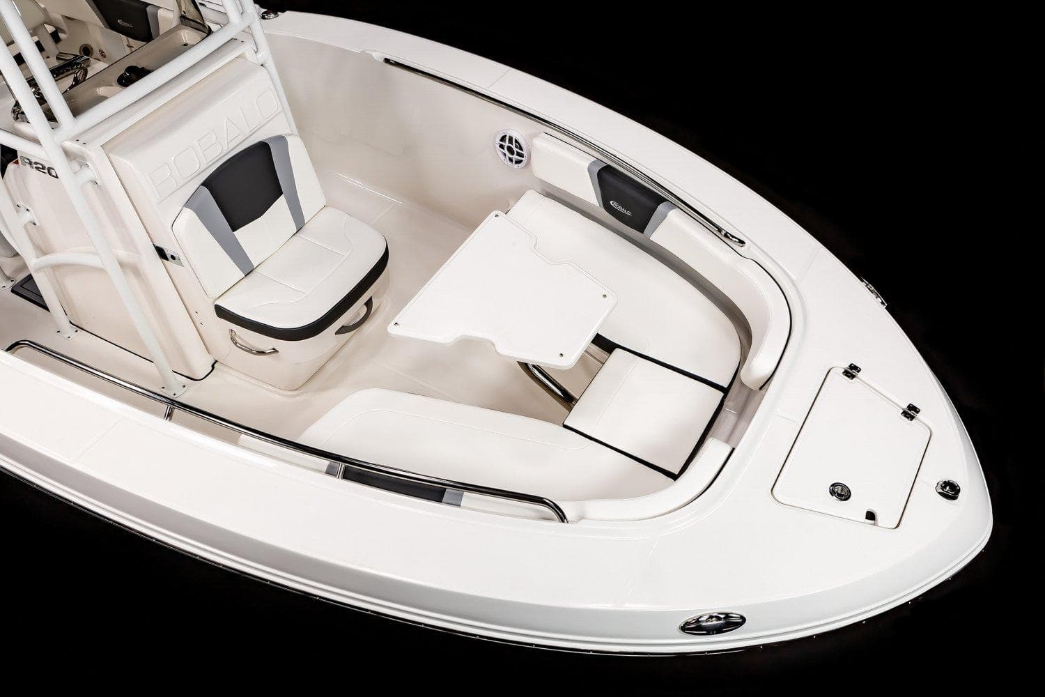 2025 Robalo R200 Center Console boat interior with seating and table.