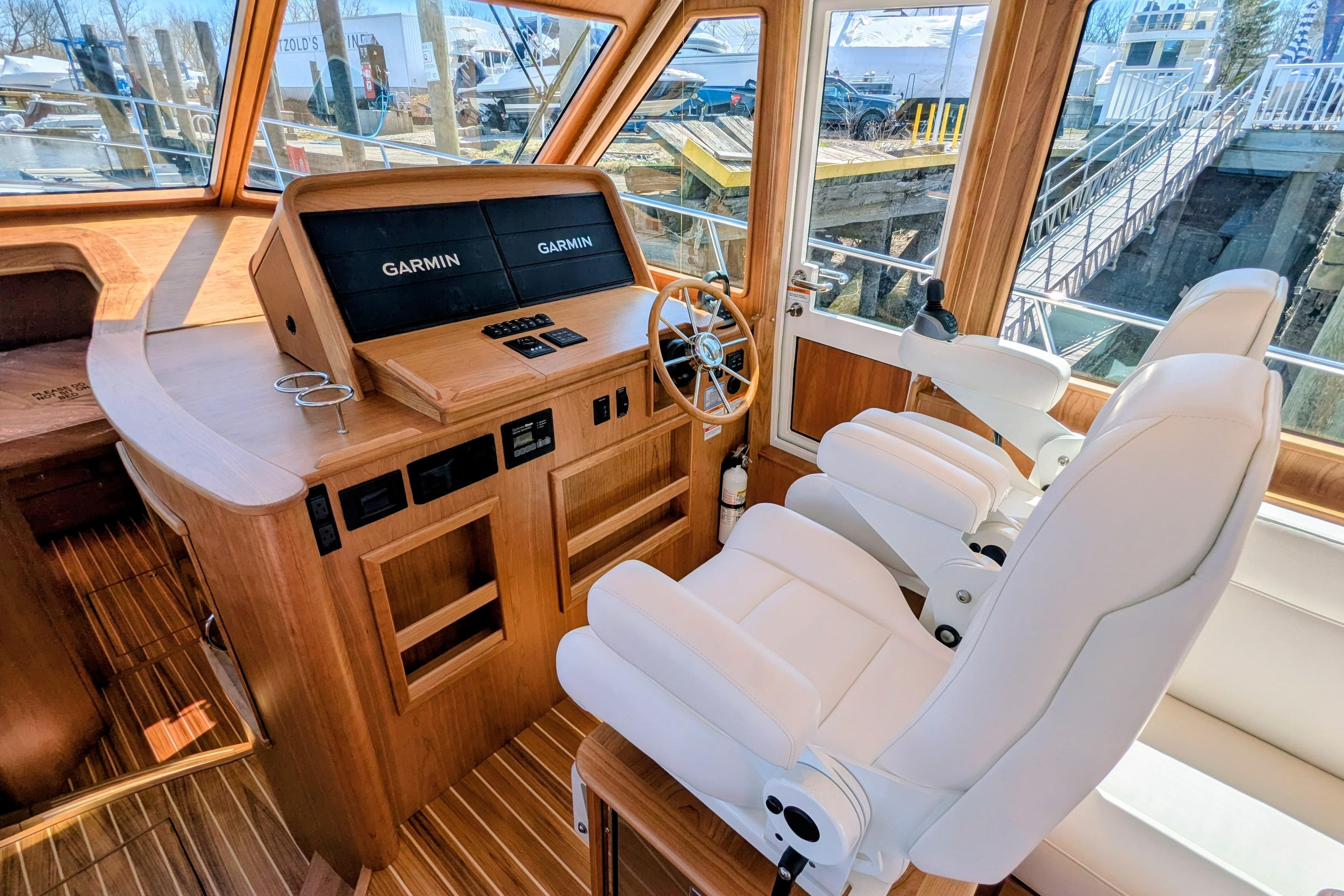 Interior of 2026 Sabre 45 Salon Express yacht with Garmin navigation system.