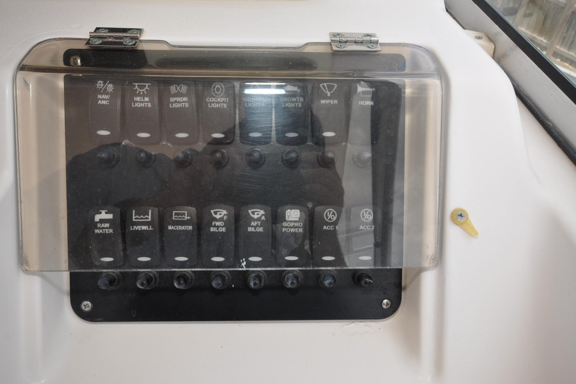 Control panel of a 1997 Grady-White Marlin 300 boat with labeled switches.