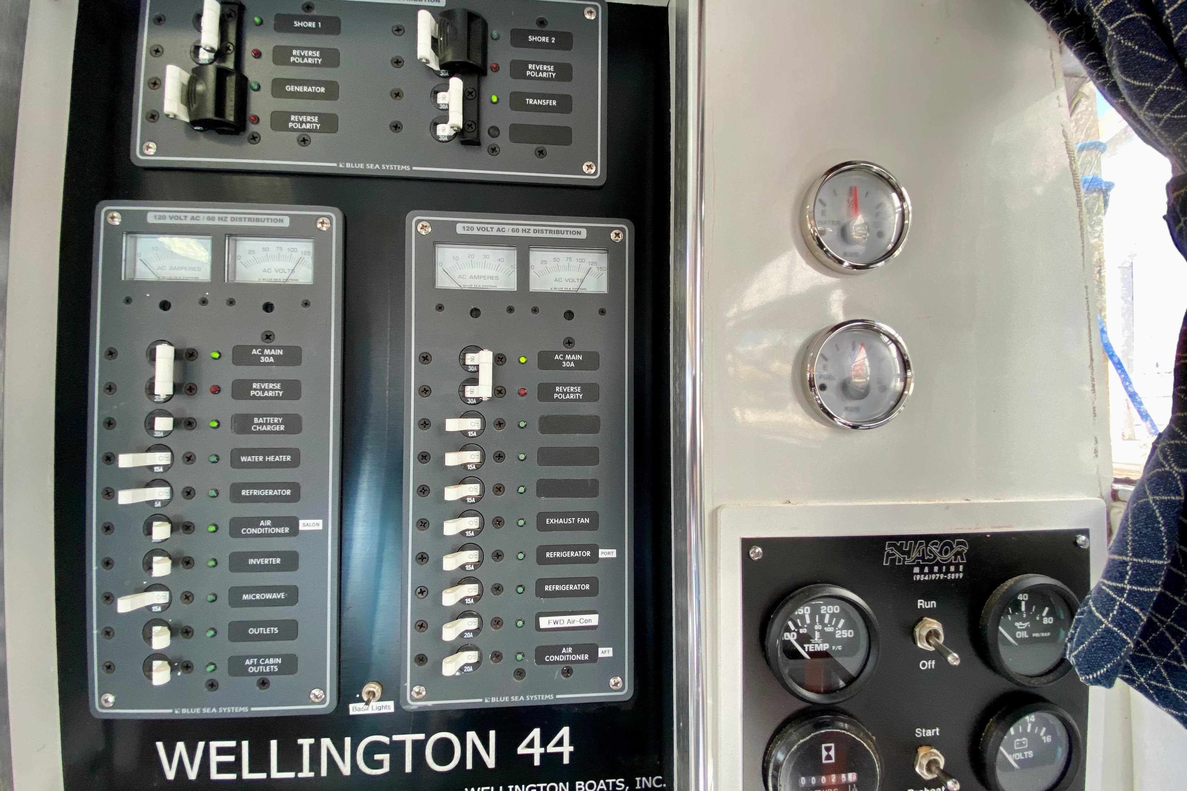 Electrical panel of 1980 Wellington 44 boat with gauges and switches.