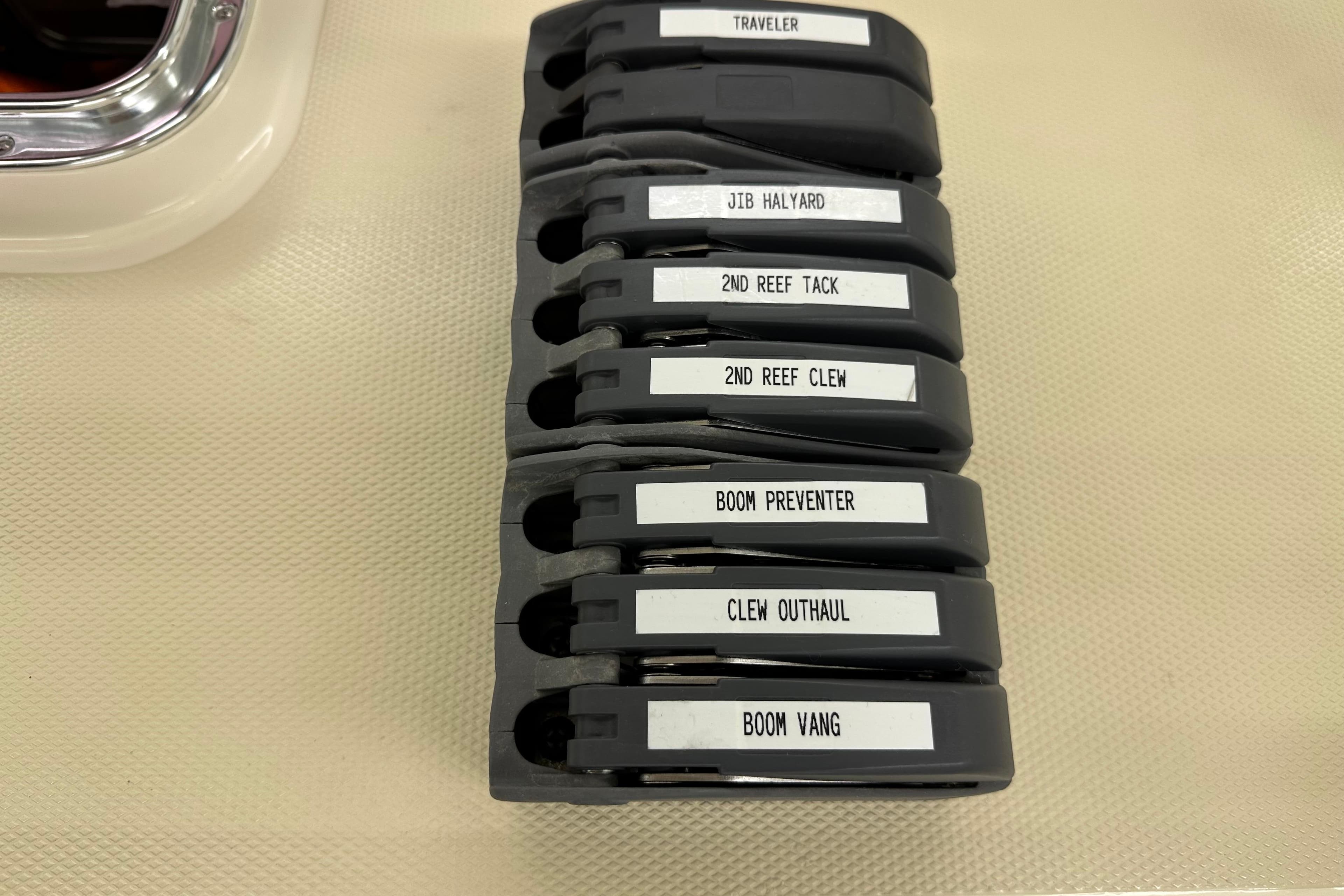 Sailing rope clutches labeled for various functions on a 2007 Sabre 386 yacht.