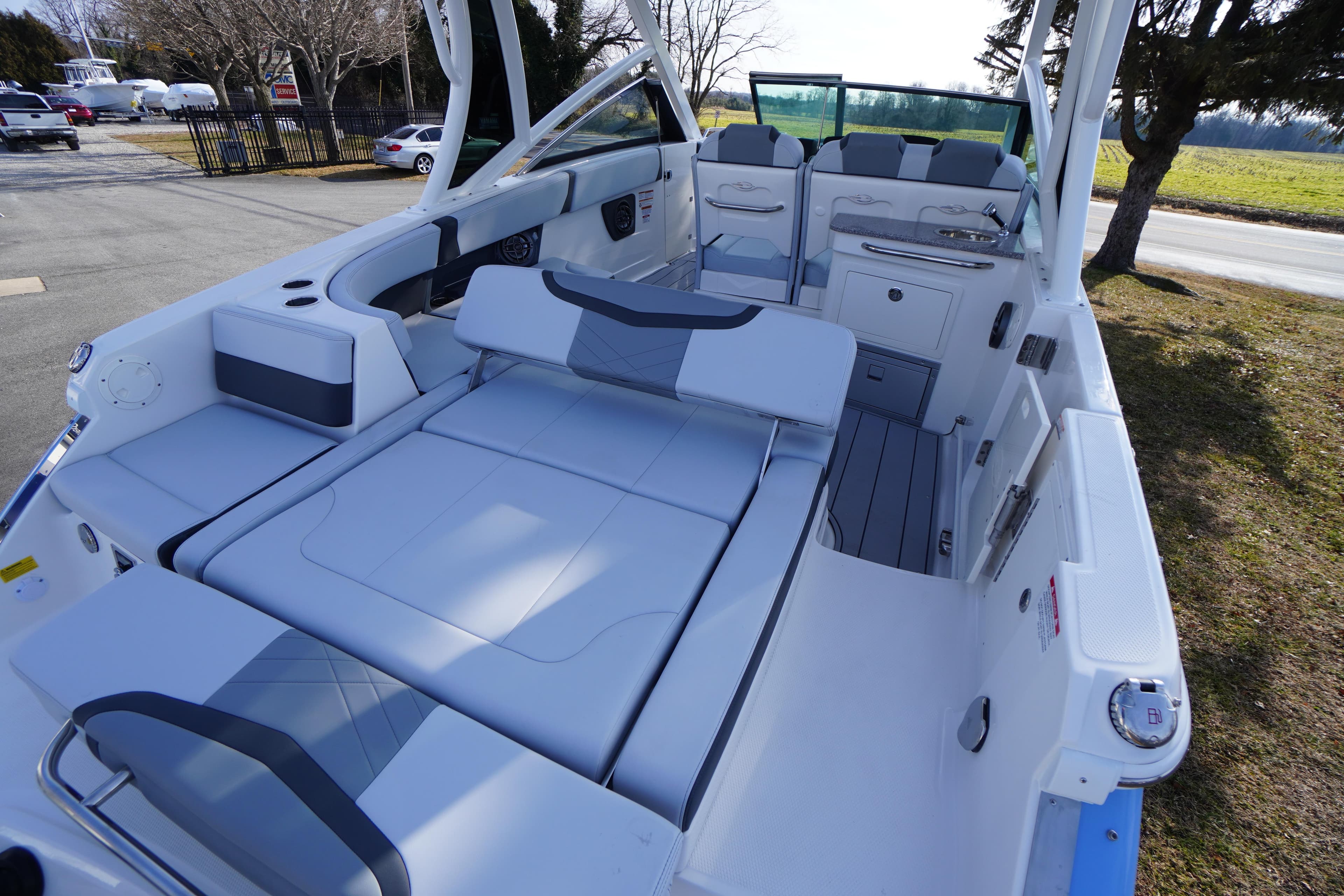 2026 Chaparral 280 OSX boat interior with luxurious seating and modern design.