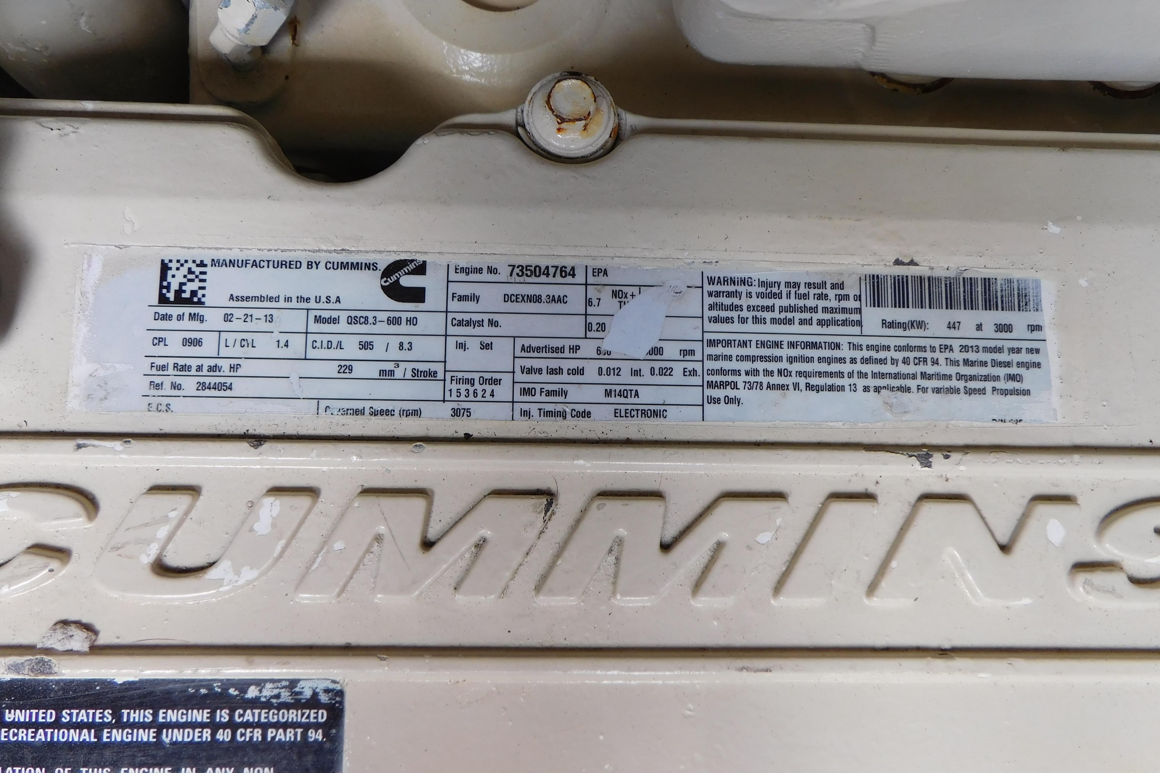 Cummins engine label on 2013 Sea Ray 510 Sundancer, detailing specifications and warnings.