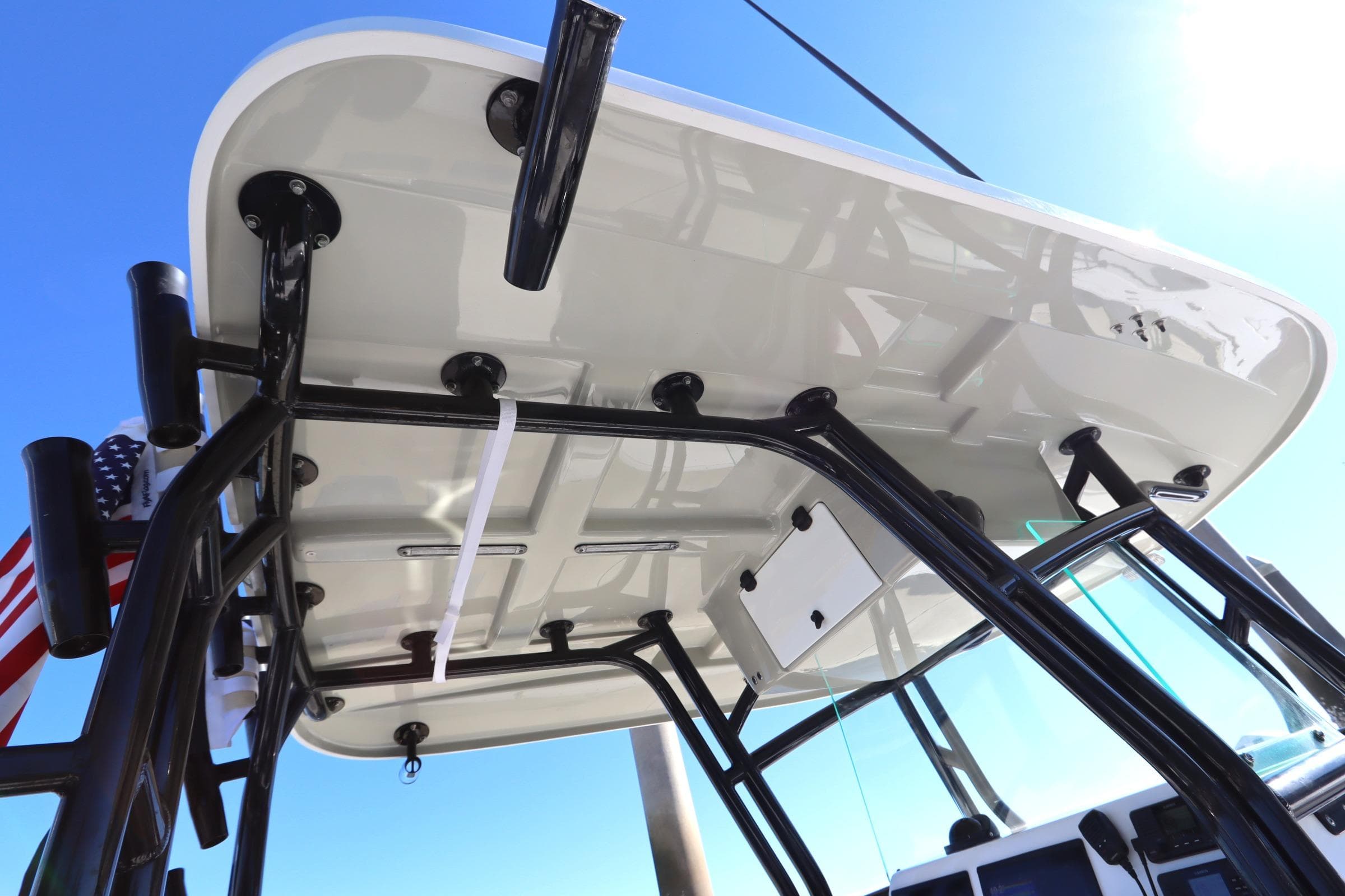 2021 Cape Horn 31 T boat's T-top structure against clear blue sky.