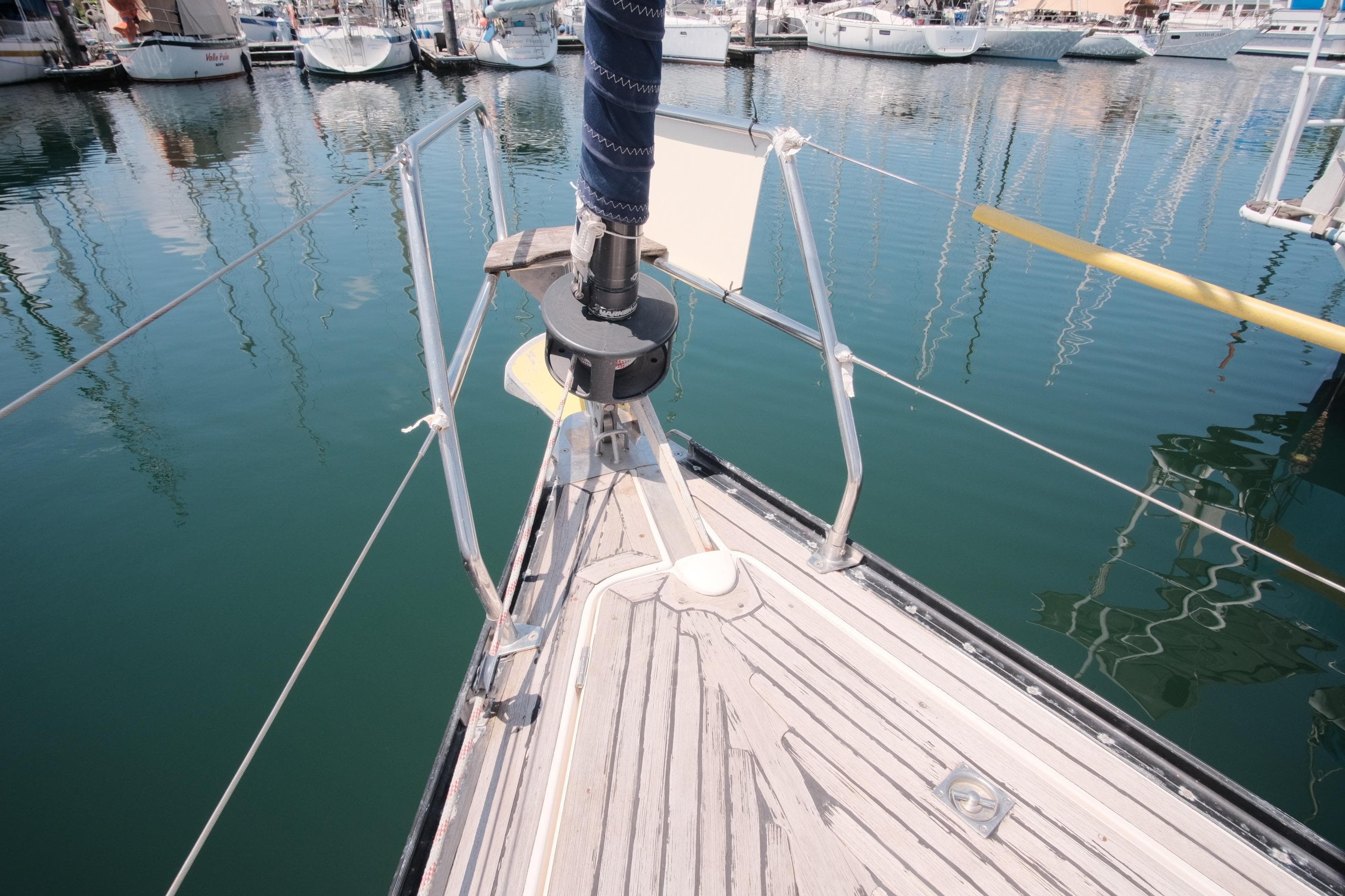 Bow of 2000 X-Yachts 442 MK II sailboat docked in marina.