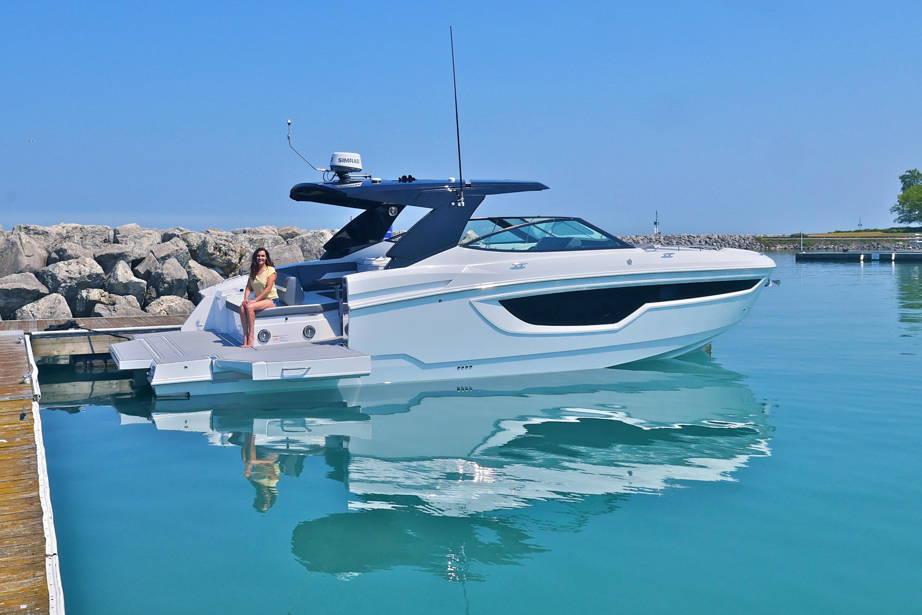 2026 Cruisers Yachts 38 GLS I/O docked, featuring sleek design and modern amenities.