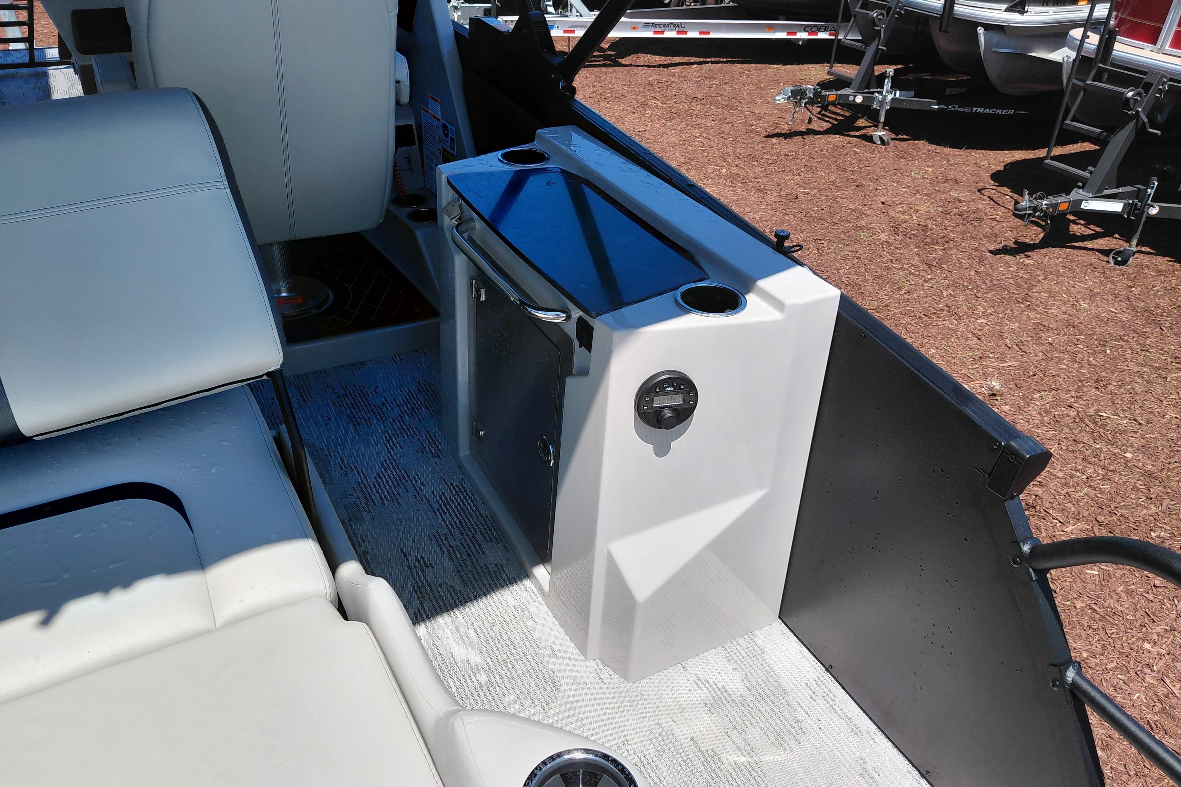 Interior of 2026 Starcraft RX 23 Q DH boat with seating and control panel.