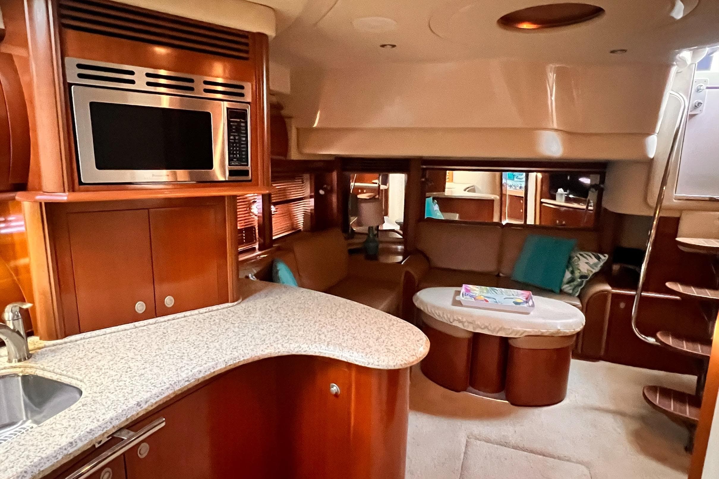 Luxurious interior of 2005 Sea Ray 500 Sundancer yacht with modern amenities.