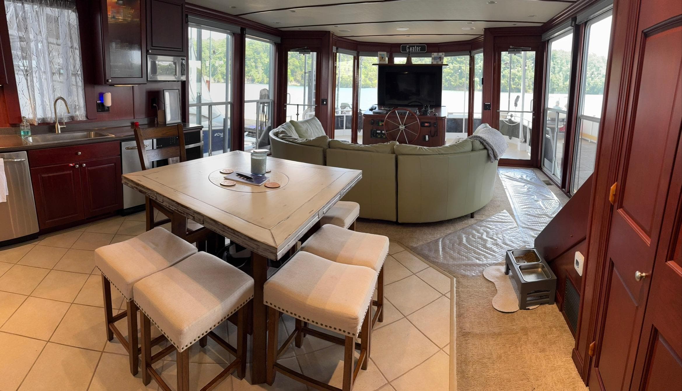 Luxurious 2007 Skipperliner 640 interior with modern kitchen, dining area, and cozy living space.