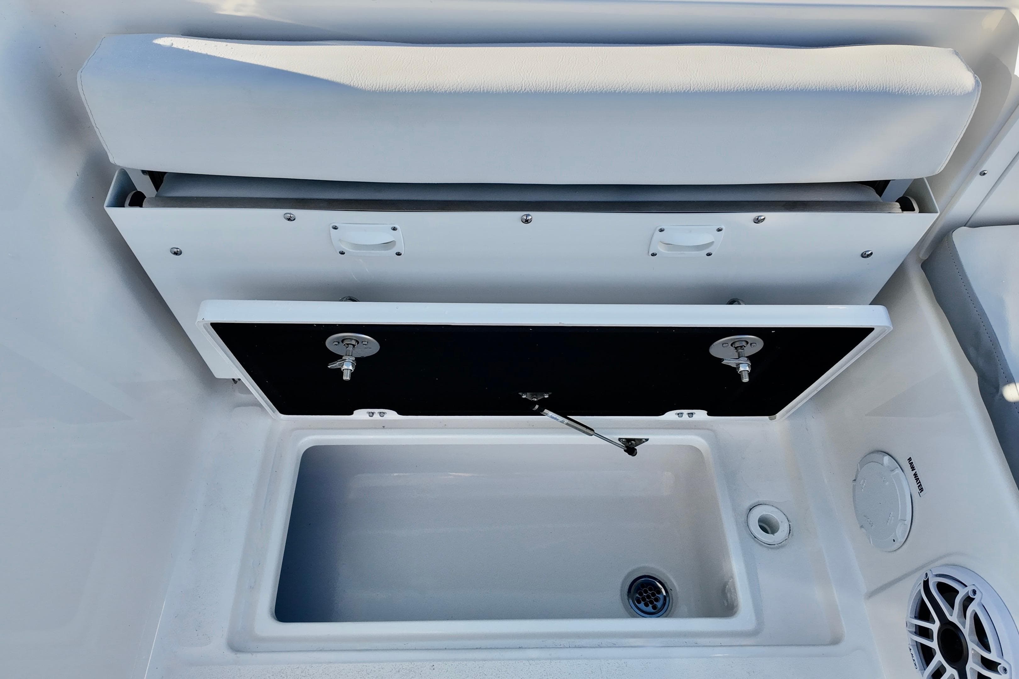 2026 Sea Fox 288 Traveler boat storage compartment with open hatch and seating.