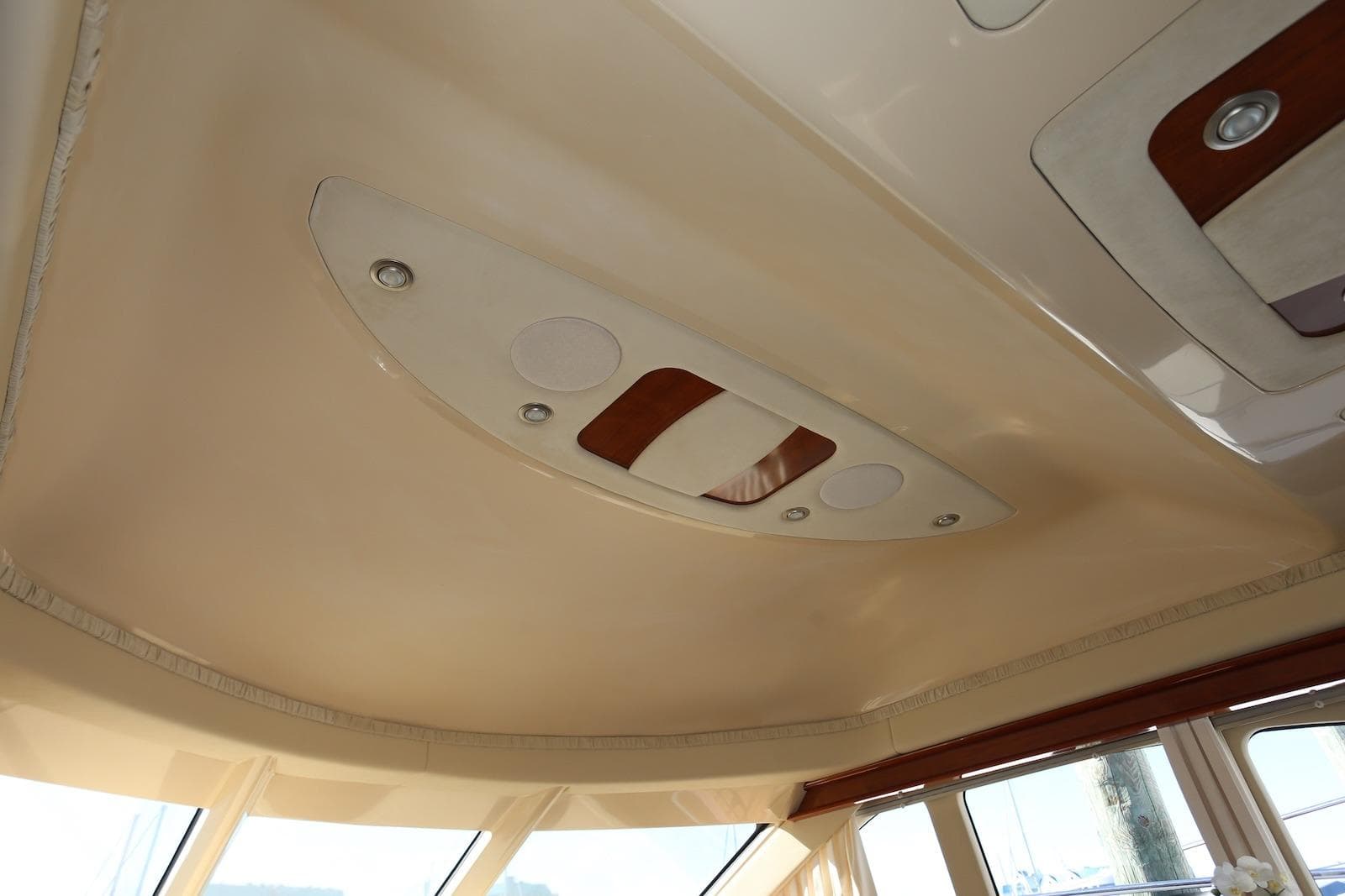 Interior ceiling of 2004 Sea Ray 420 Sedan Bridge yacht with modern lighting fixtures.