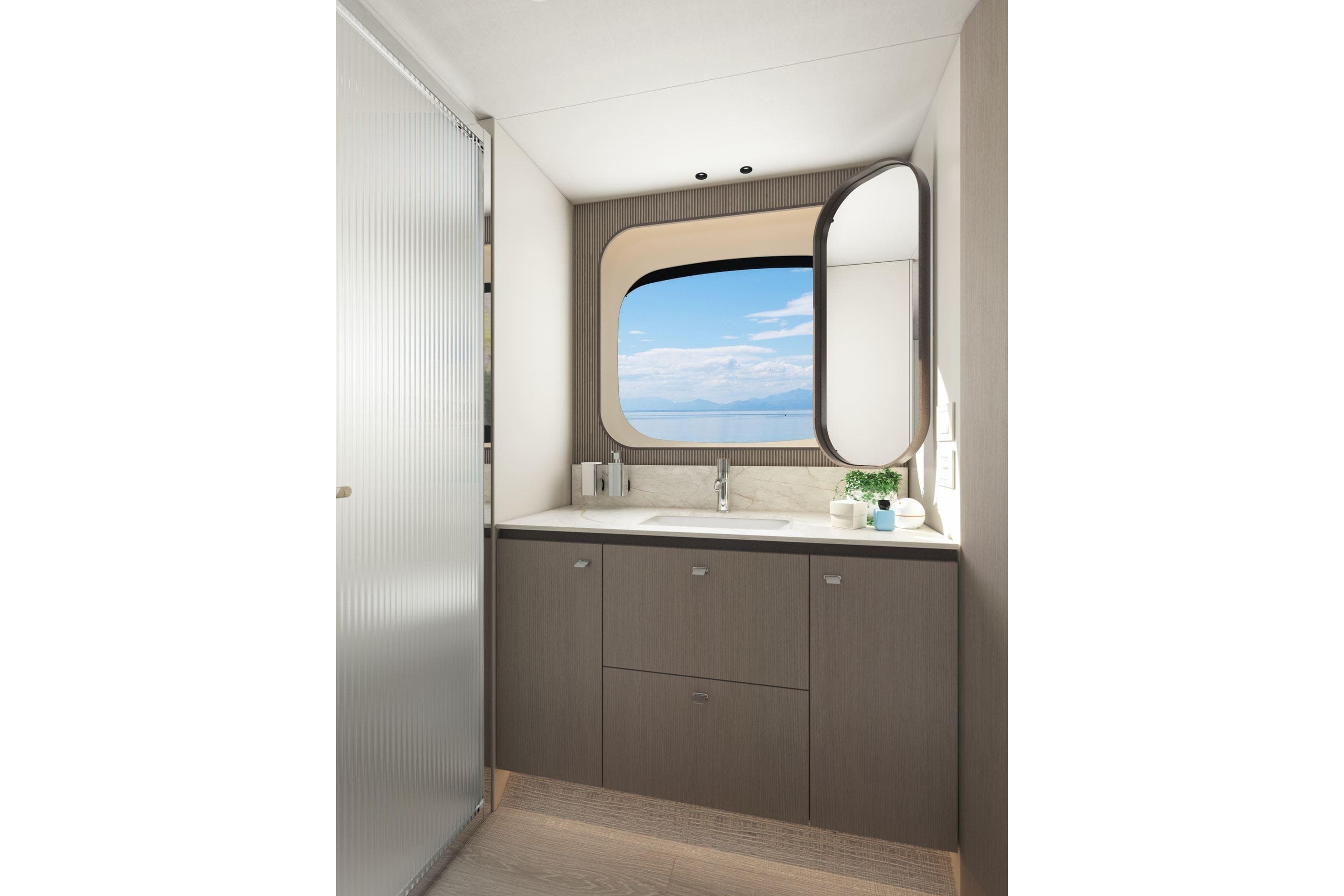 Luxurious bathroom interior of 2026 Absolute 58 Navetta yacht with ocean view window.