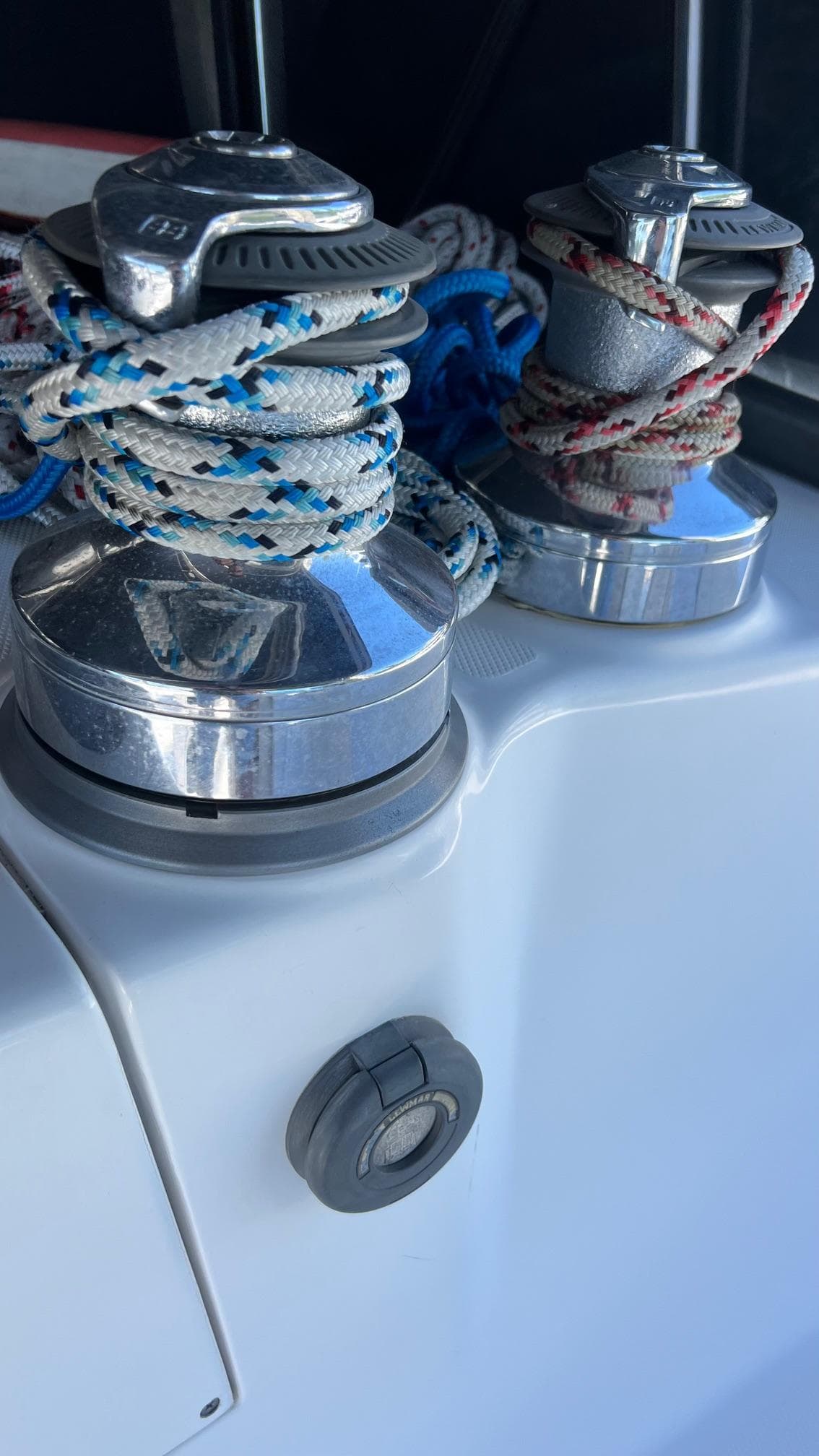 Sailboat winches with ropes on a 2000 Hunter 410 yacht.