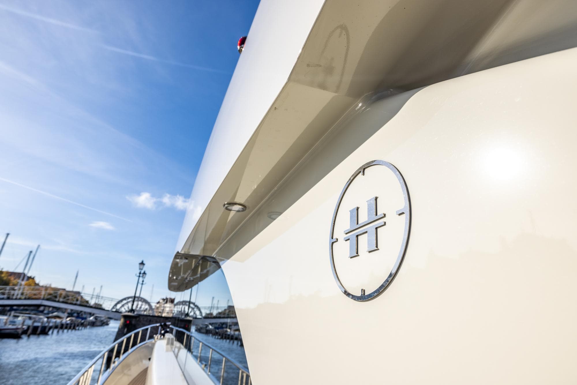 Luxury yacht Van den Hoven Executive 18.50, 2021 model, docked in a marina.