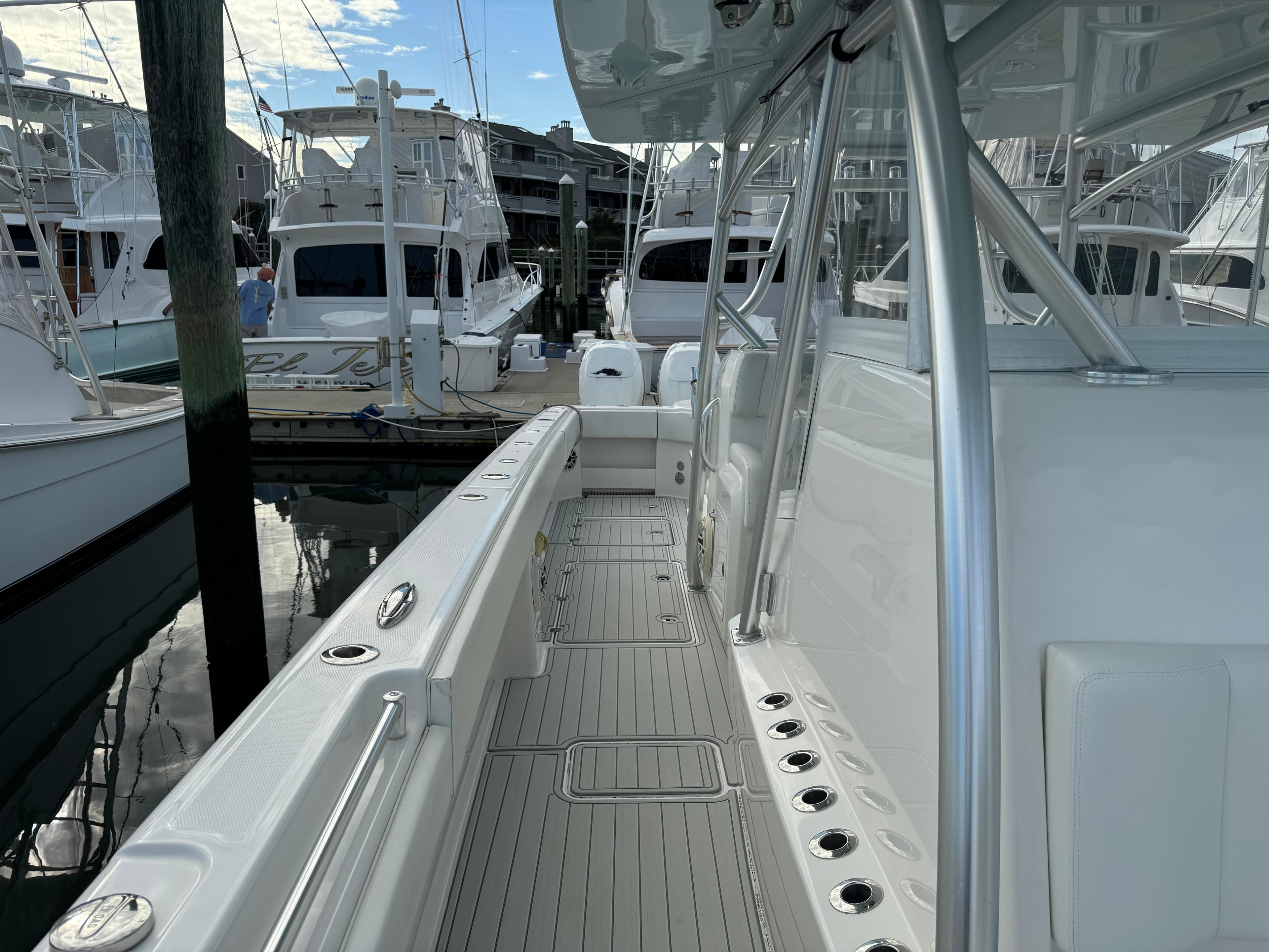 2020 Invincible 40 Catamaran docked, showcasing sleek design and spacious deck layout.