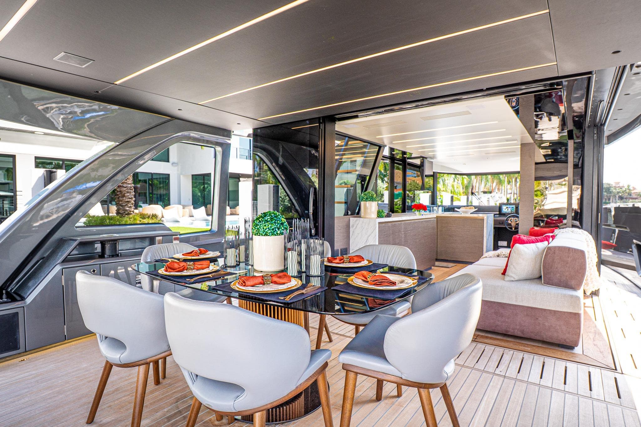 Luxurious 2024 Explorer EX62 yacht interior with elegant dining area and modern decor.