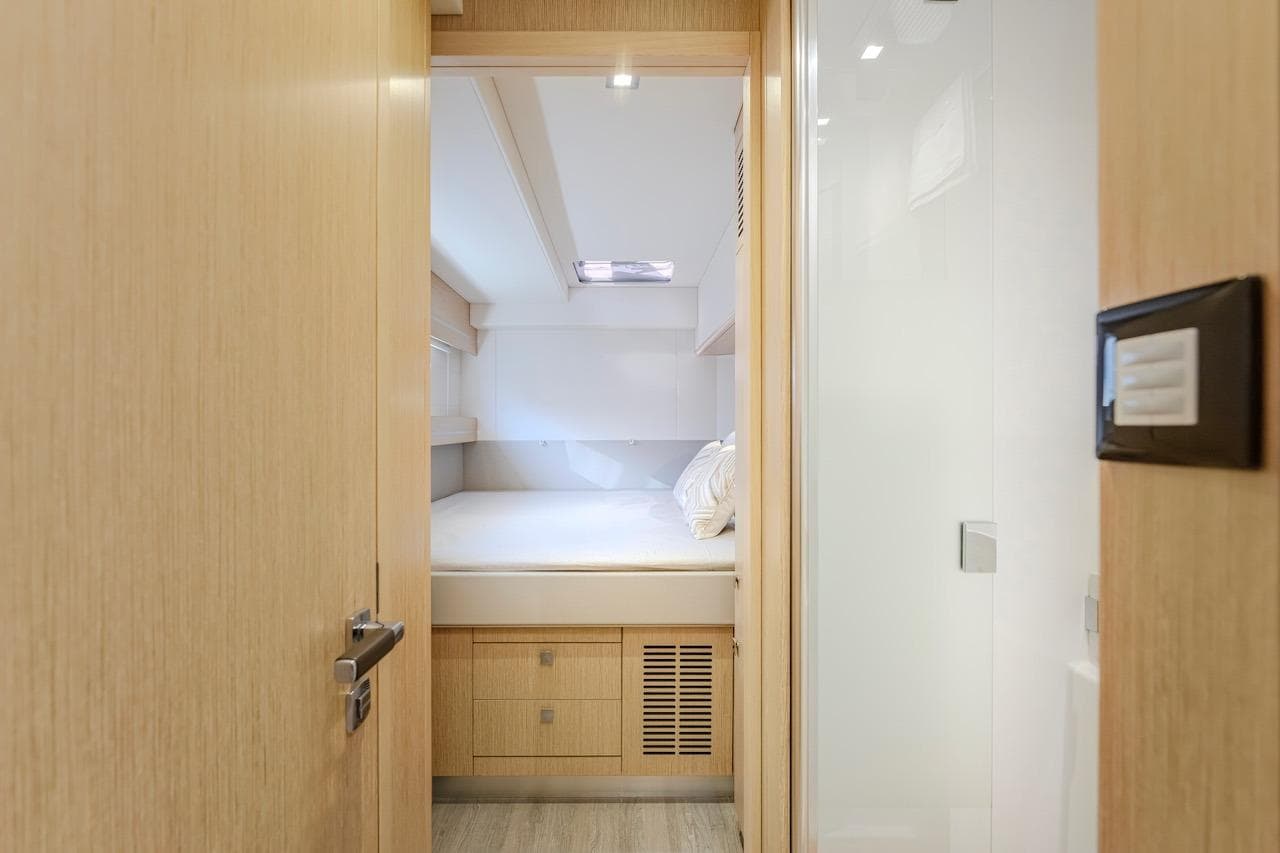 Interior of Privilege Signature 510 yacht, bedroom view, year 2025.