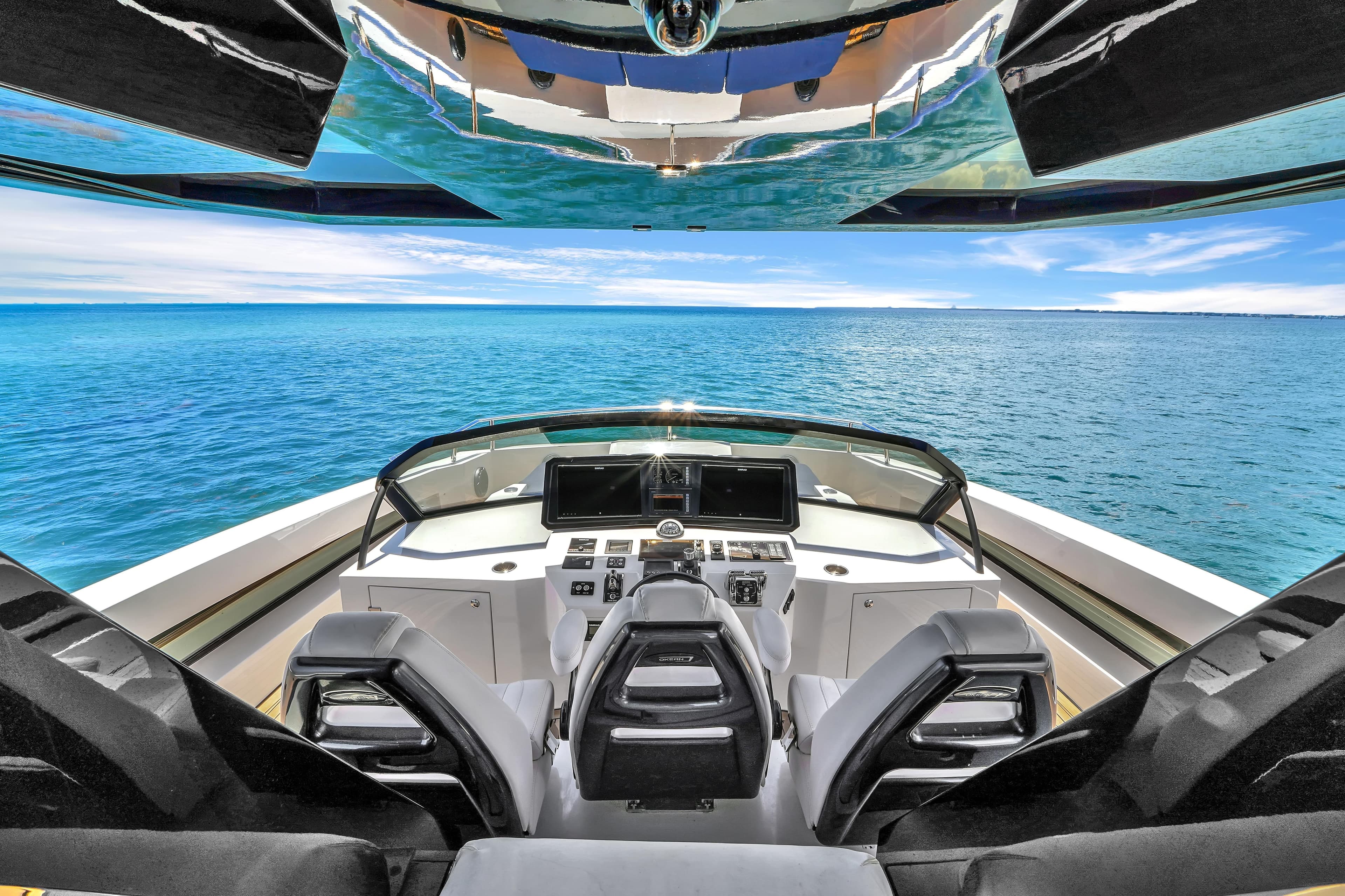 Luxury OKEAN 80 yacht helm with ocean view, 2021 model.