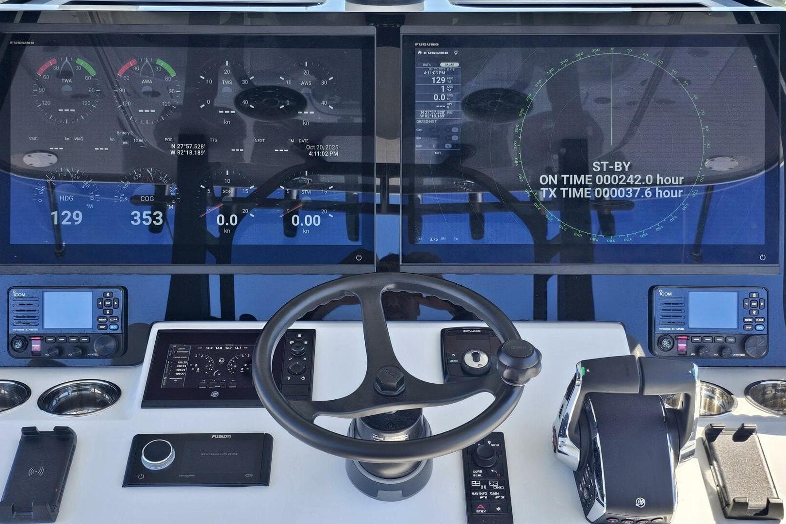 Cockpit of 2025 Costa Custom Boats 34ST with advanced navigation displays and controls.