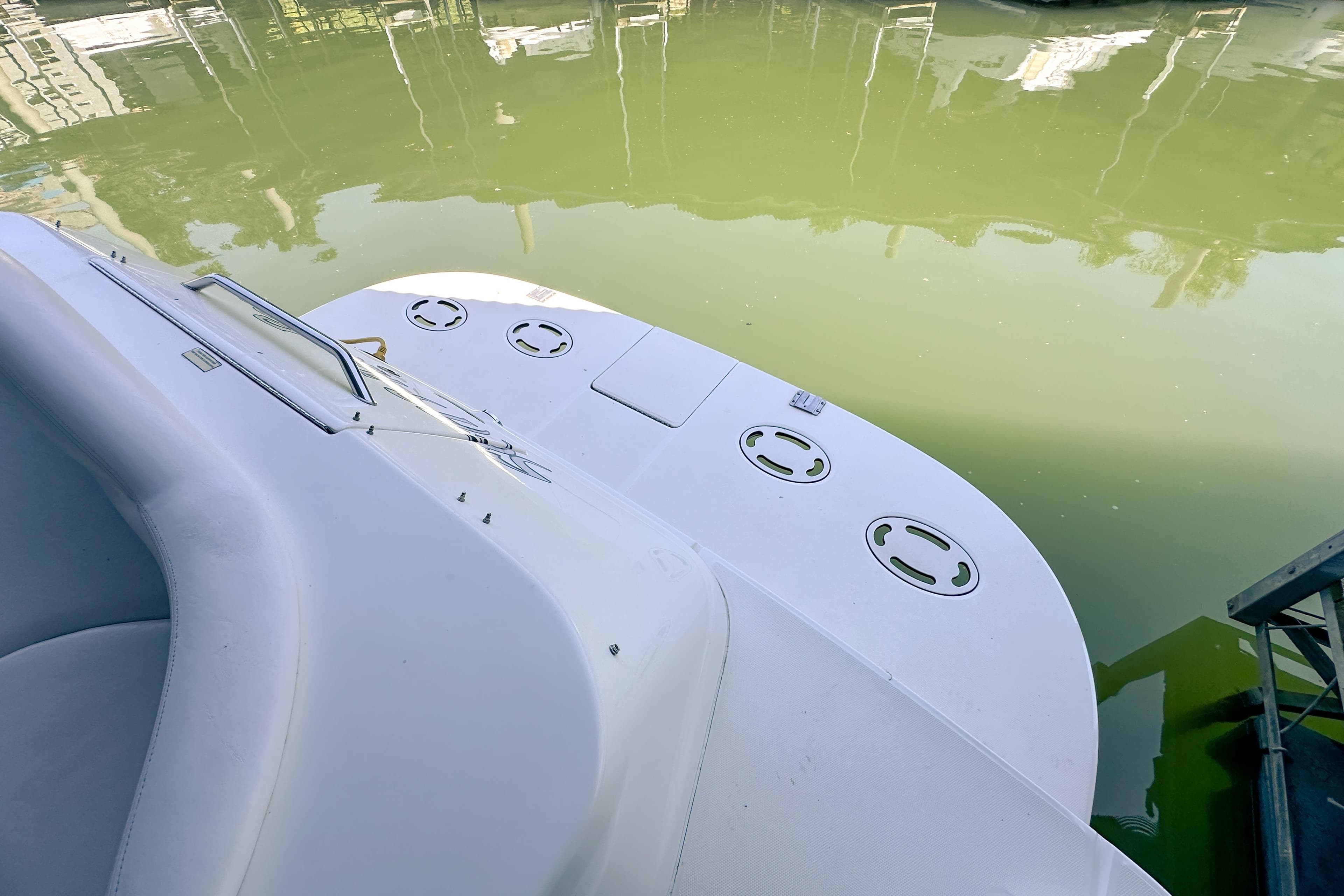 2001 Sea Ray 410 Sundancer boat deck overlooking calm water.