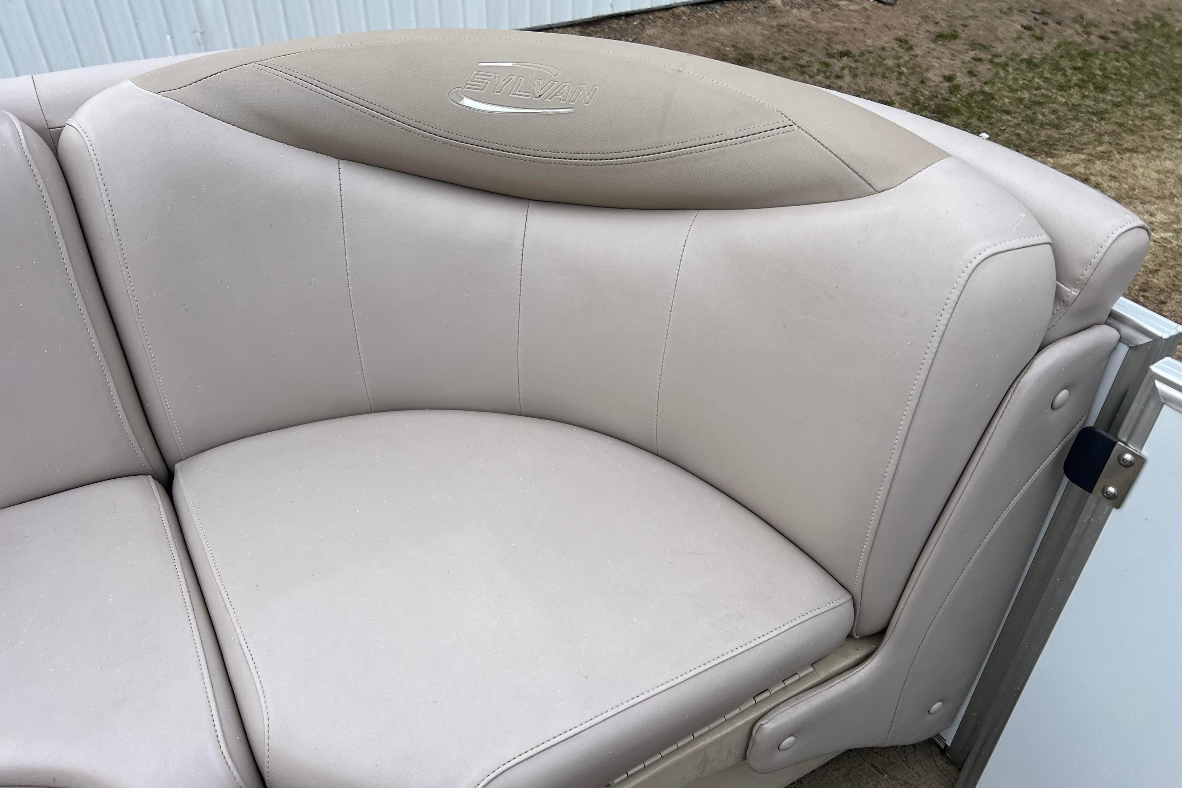 2014 Sylvan Mirage Cruise 8520 CR boat seat with beige upholstery.