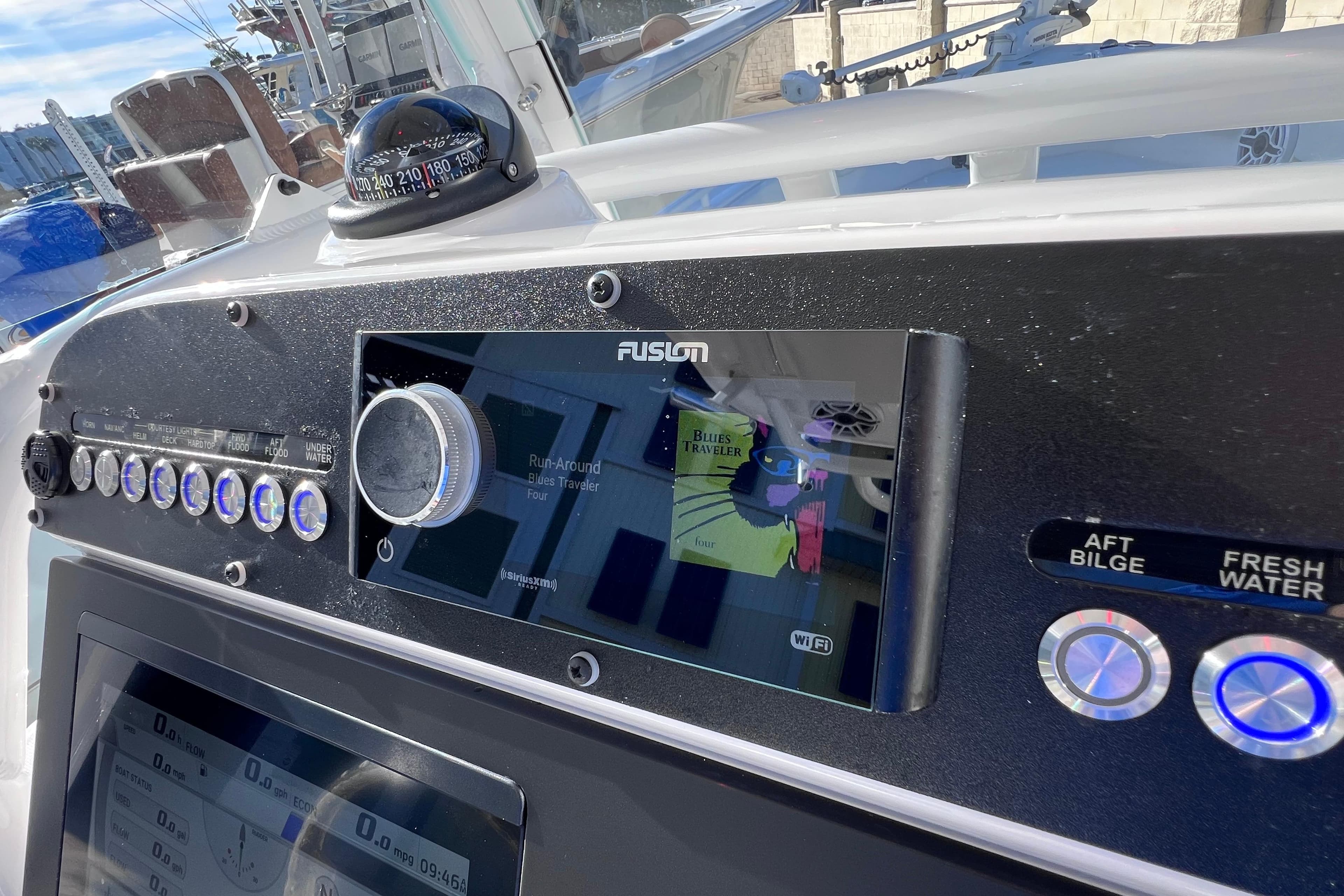 2024 Everglades 243 Center Console dashboard with Fusion stereo and navigation controls.
