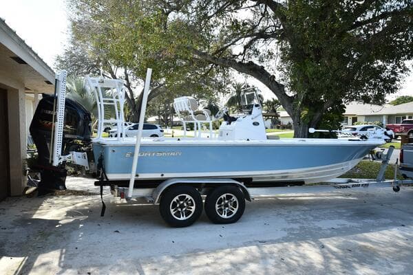 2018 Sportsman Tournament 214 Bay Boat on trailer, parked outdoors.