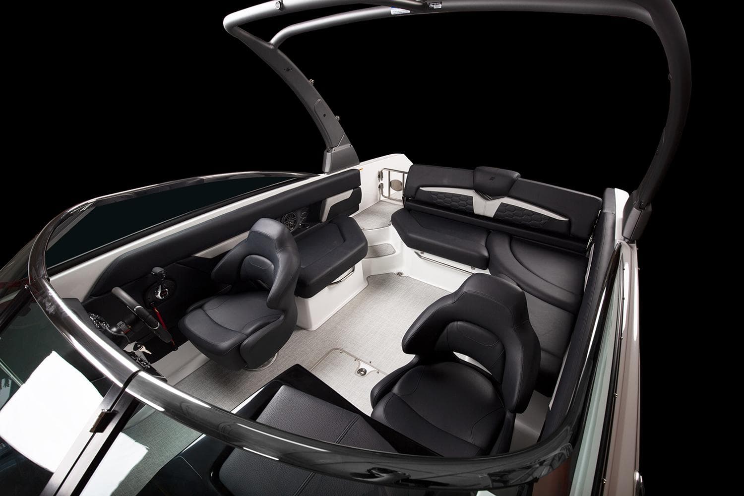 Manufacturer Provided Image: 2025 Four Winns HD5 boat interior with sleek black seating and modern design.