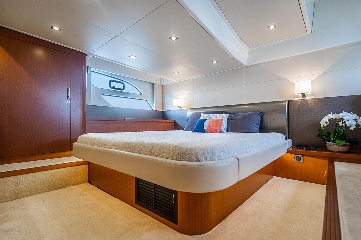 Luxurious cabin interior of 2017 Beneteau GRAN TURISMO yacht with modern design and cozy bedding.