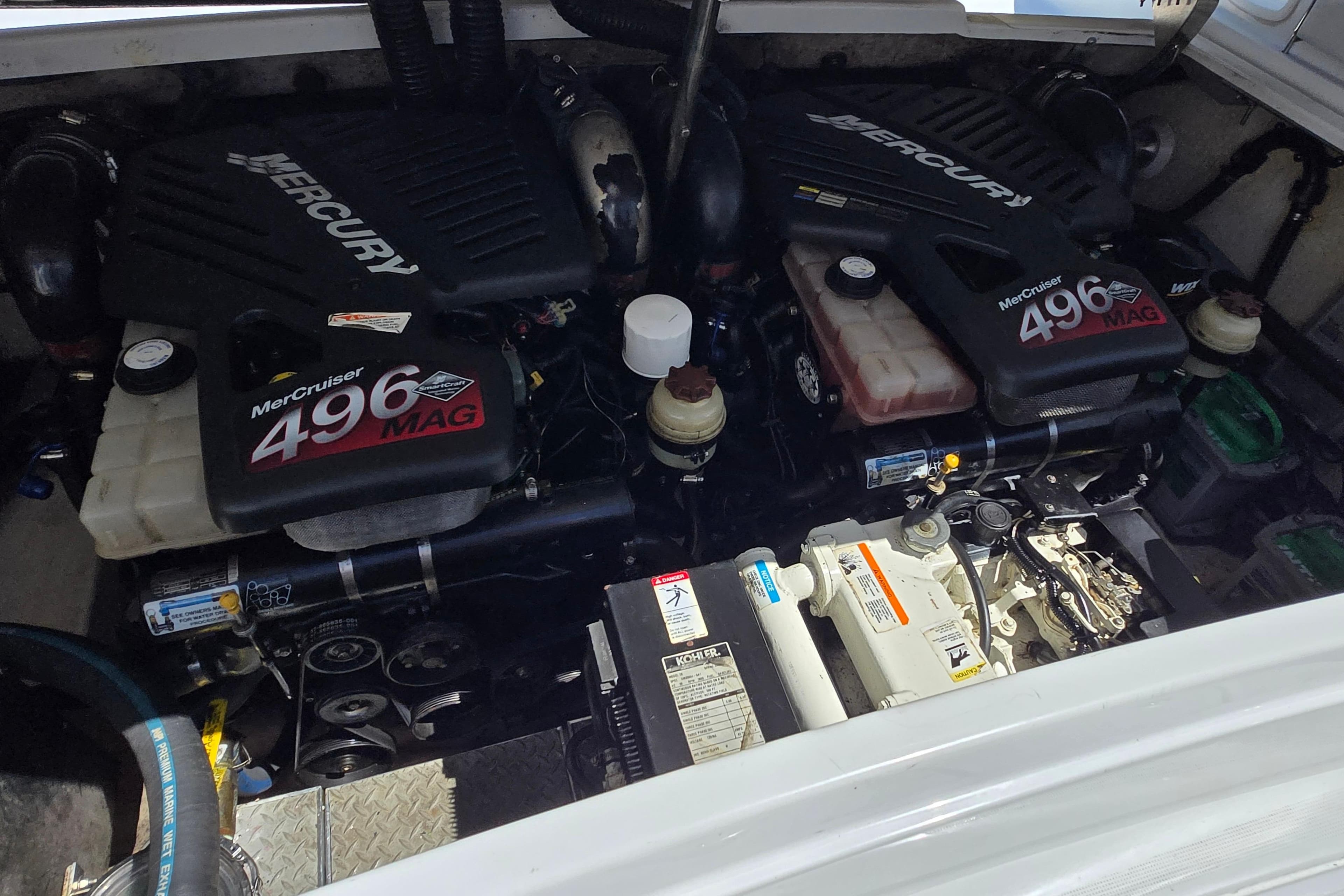 Engine compartment of a 2005 Formula 330 Sun Sport with twin MerCruiser 496 MAG engines.